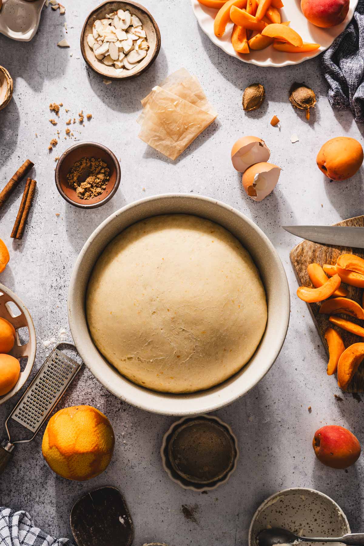 risen dough in a large bowl