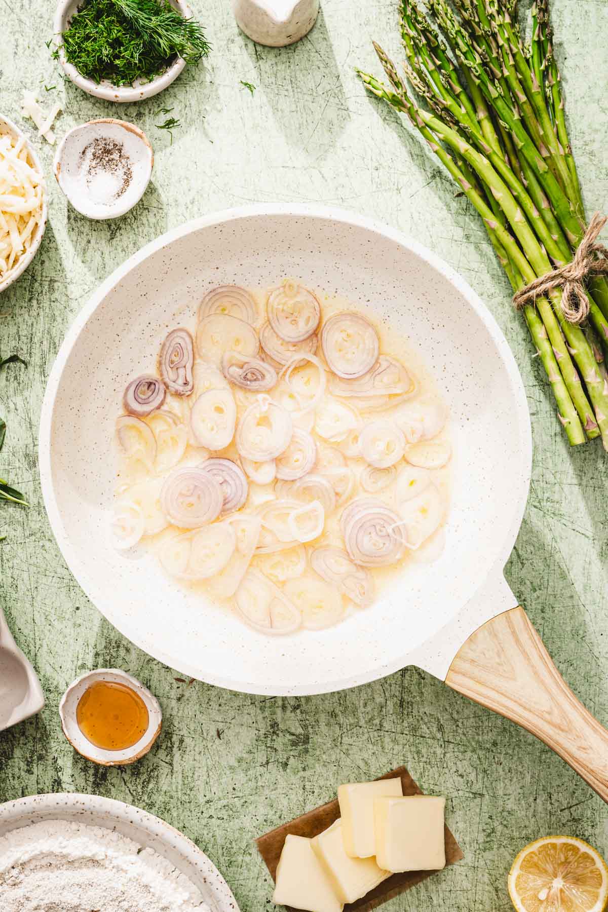 skillet with cut up shallots in butter
