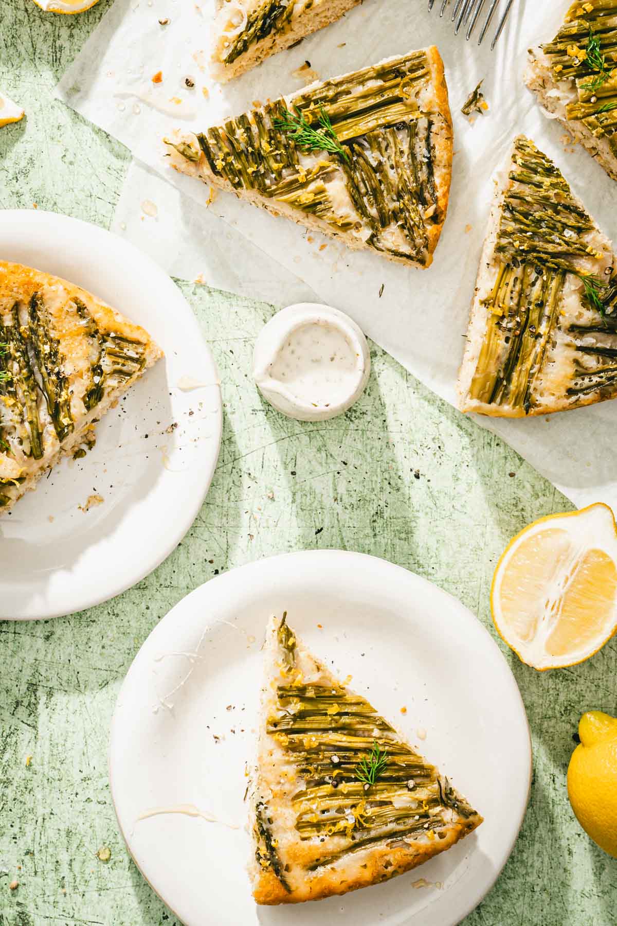 asapragus cake on serving plates, lemon,