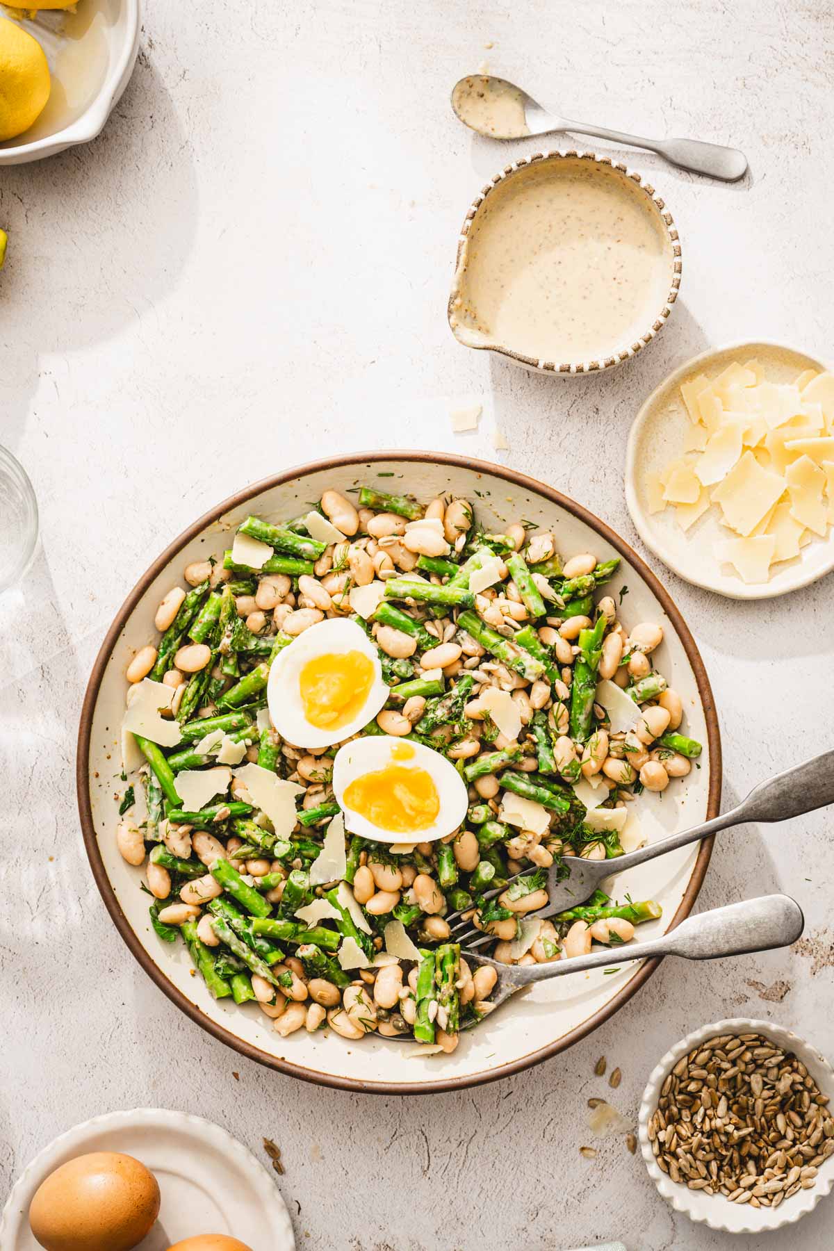 large bowl wiht the made salad, eggs on top