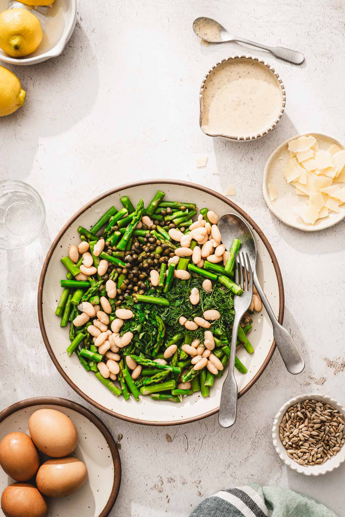 large bowl with the salad, dressing on the side