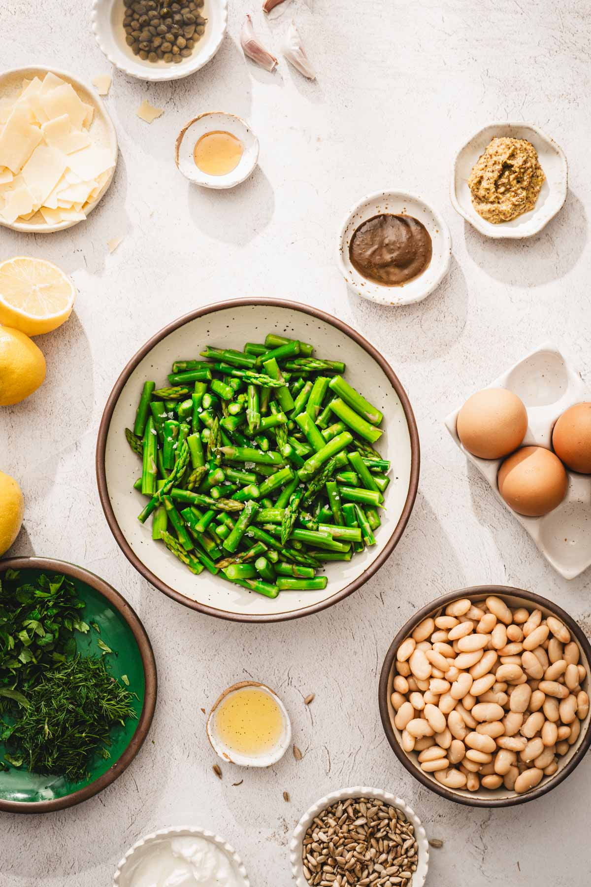 cooked asparagus in a large serving bowl