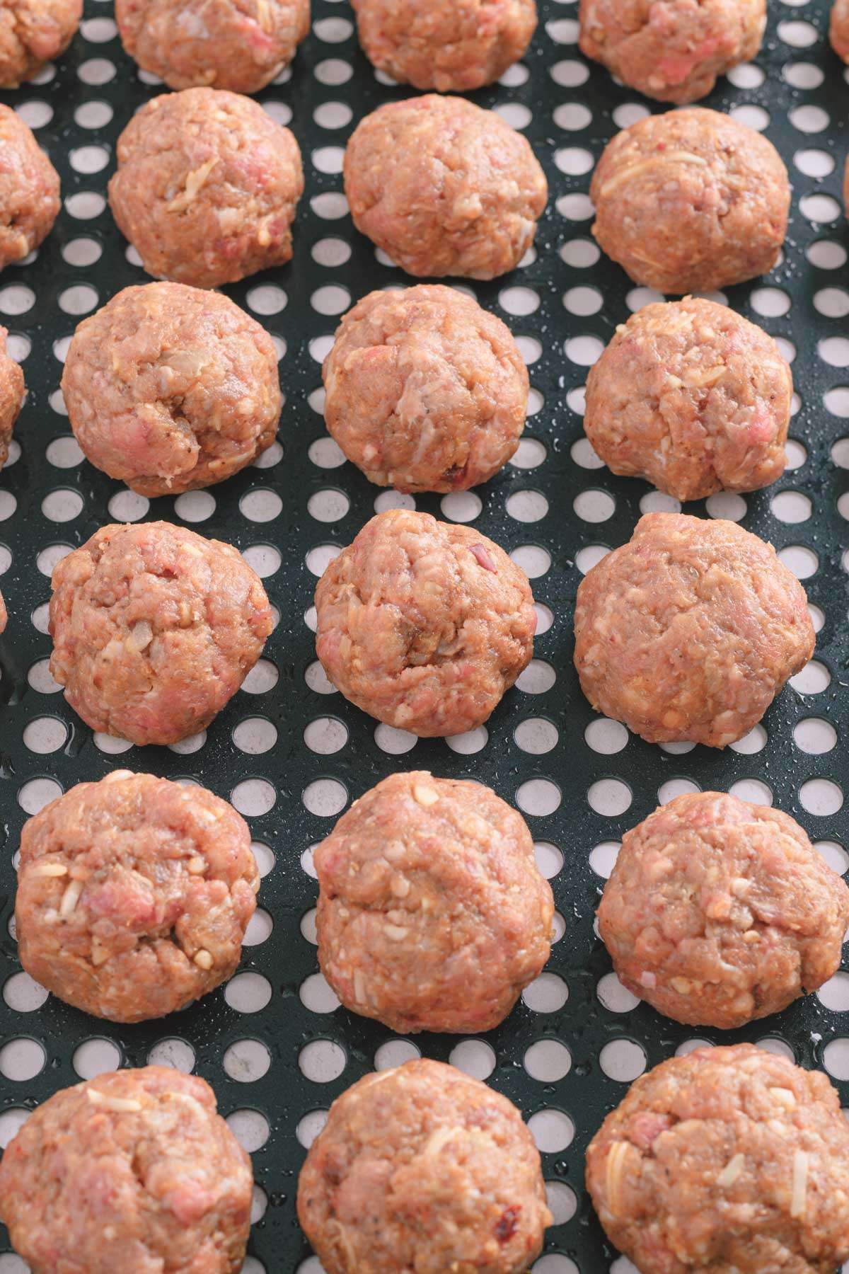 close up of raw bbq meatballs