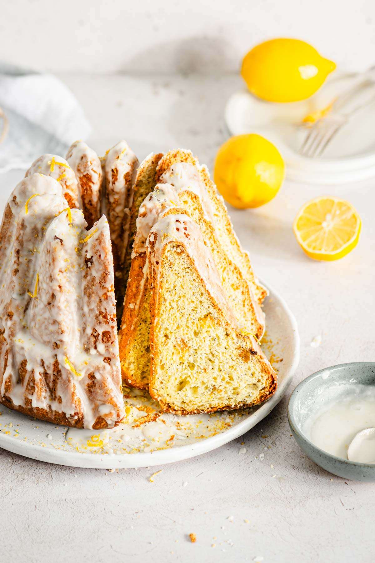 babka with few slices cut out, lemons in the background