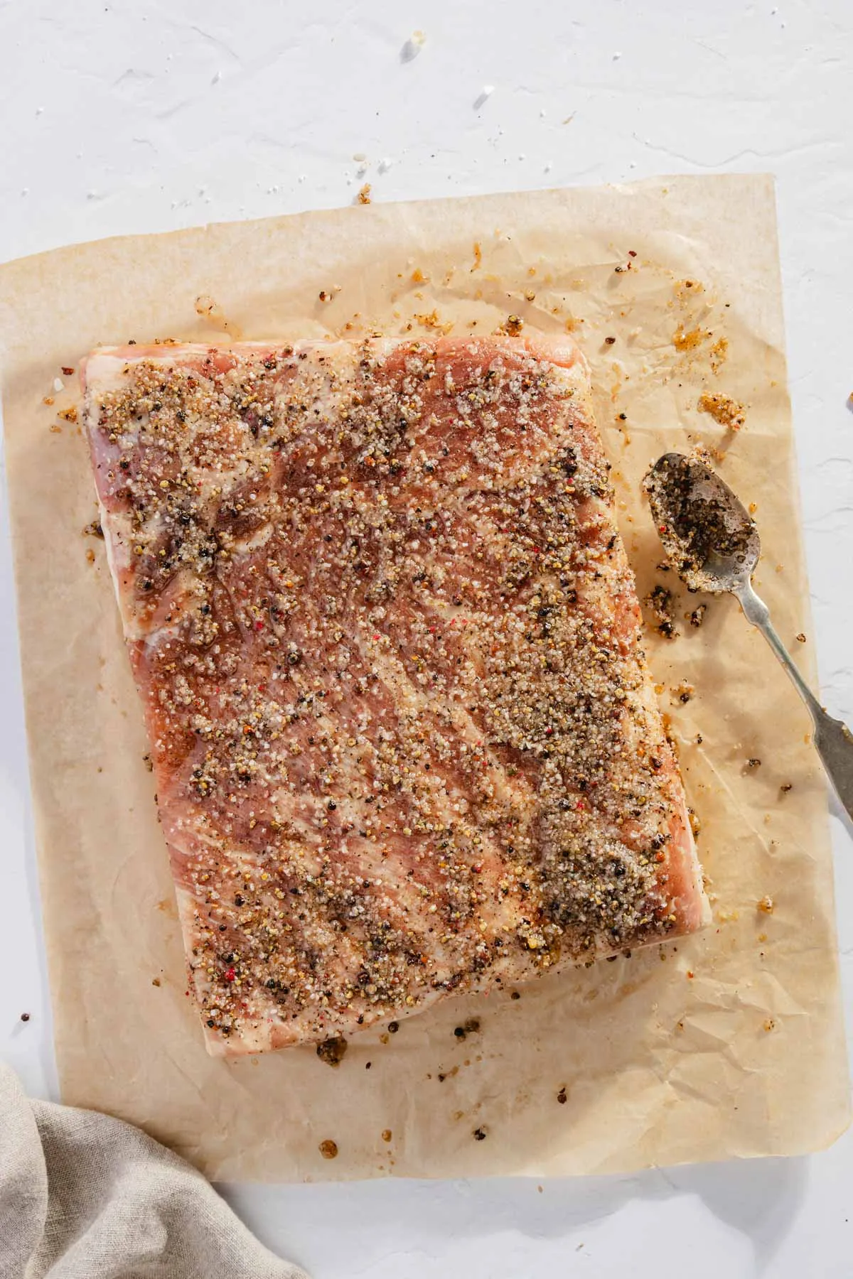 pork belly with cure applied to it