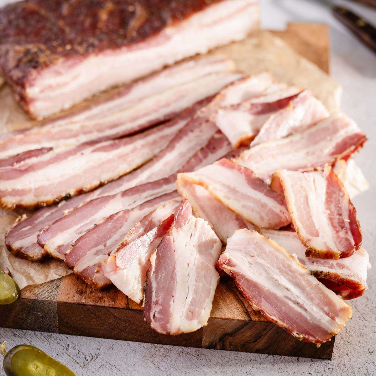 close up of cured and smoked bacon slices