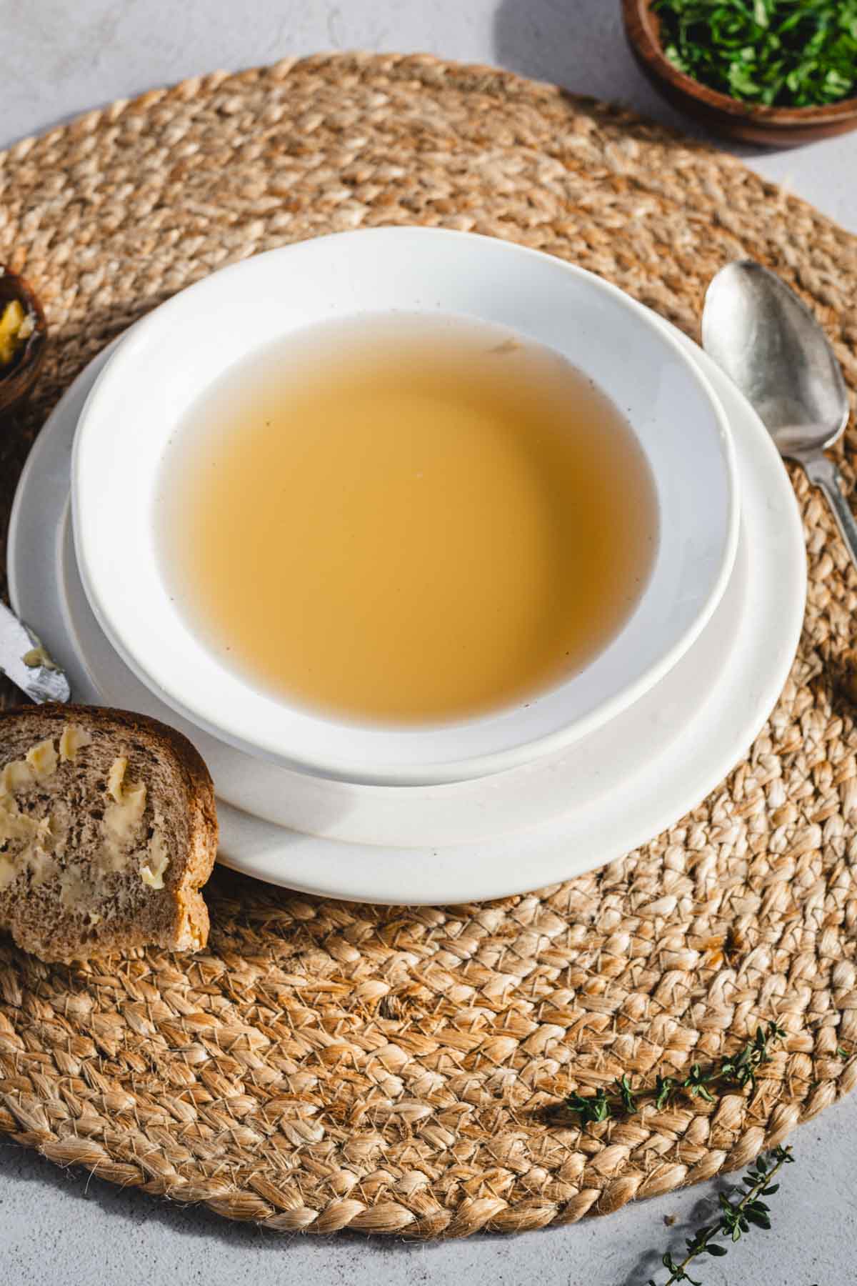 beef bone broth in a soup bowl