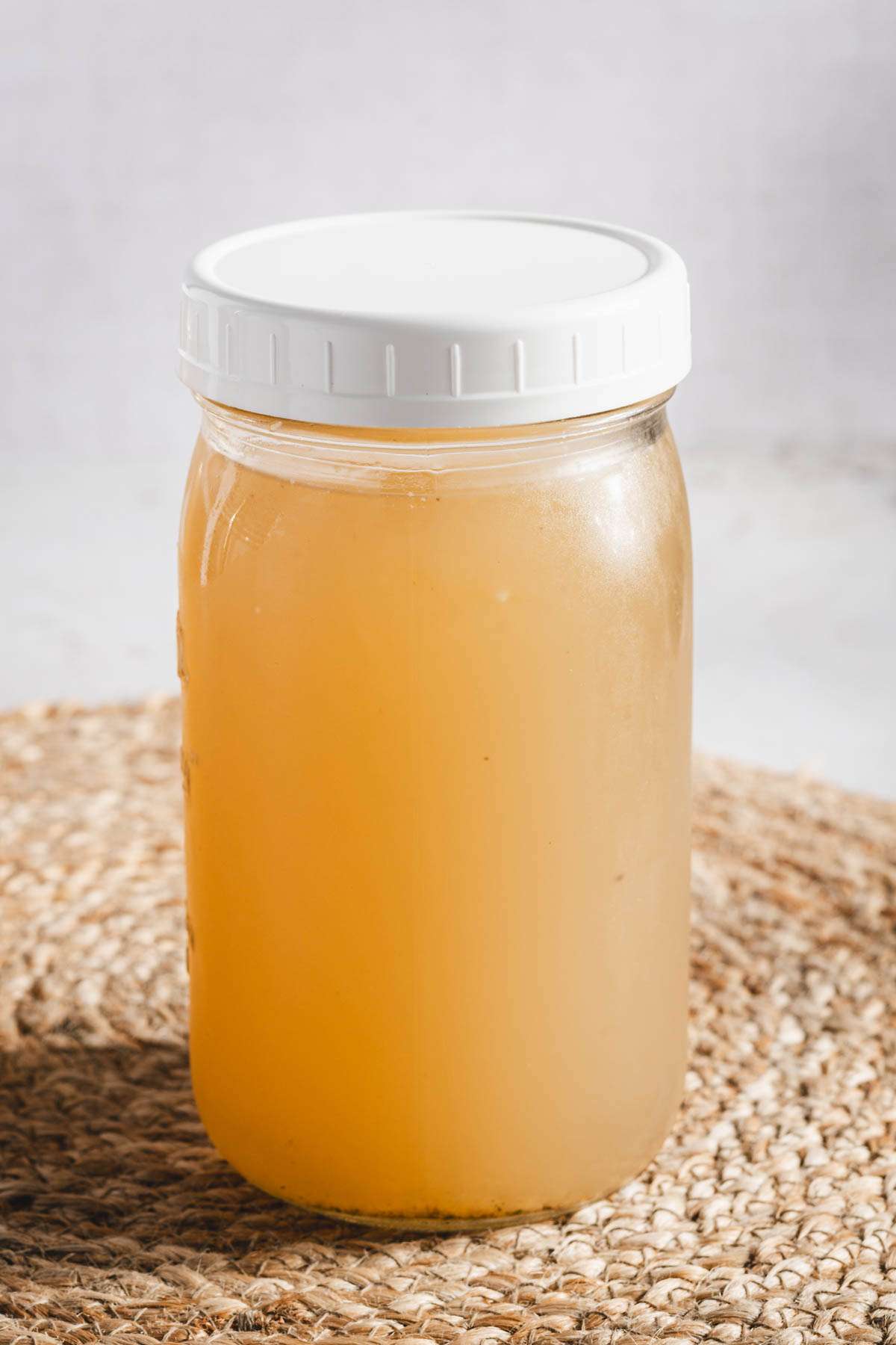 beef bone broth in a mason jar