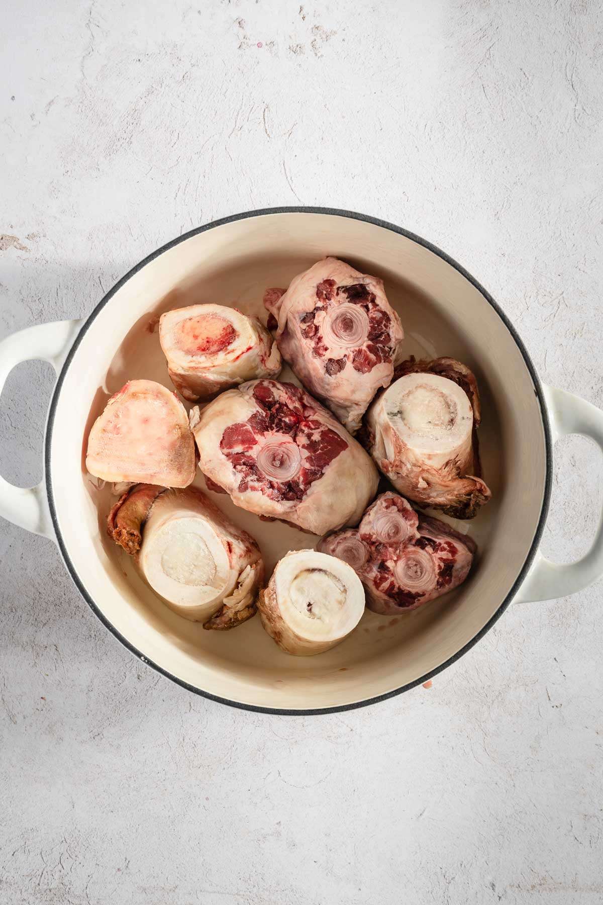 beef bones in a cooking pan