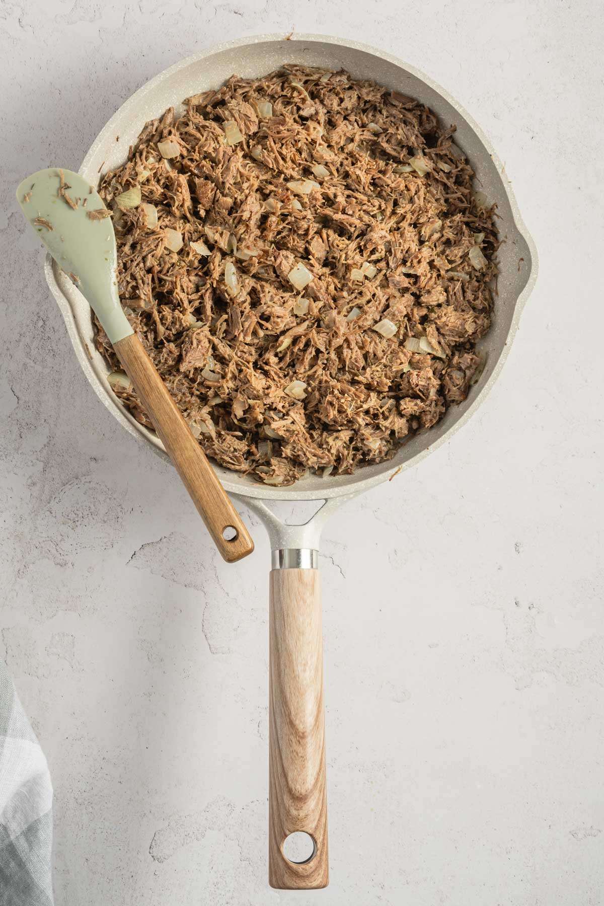 frying pan with the cooked beef filling