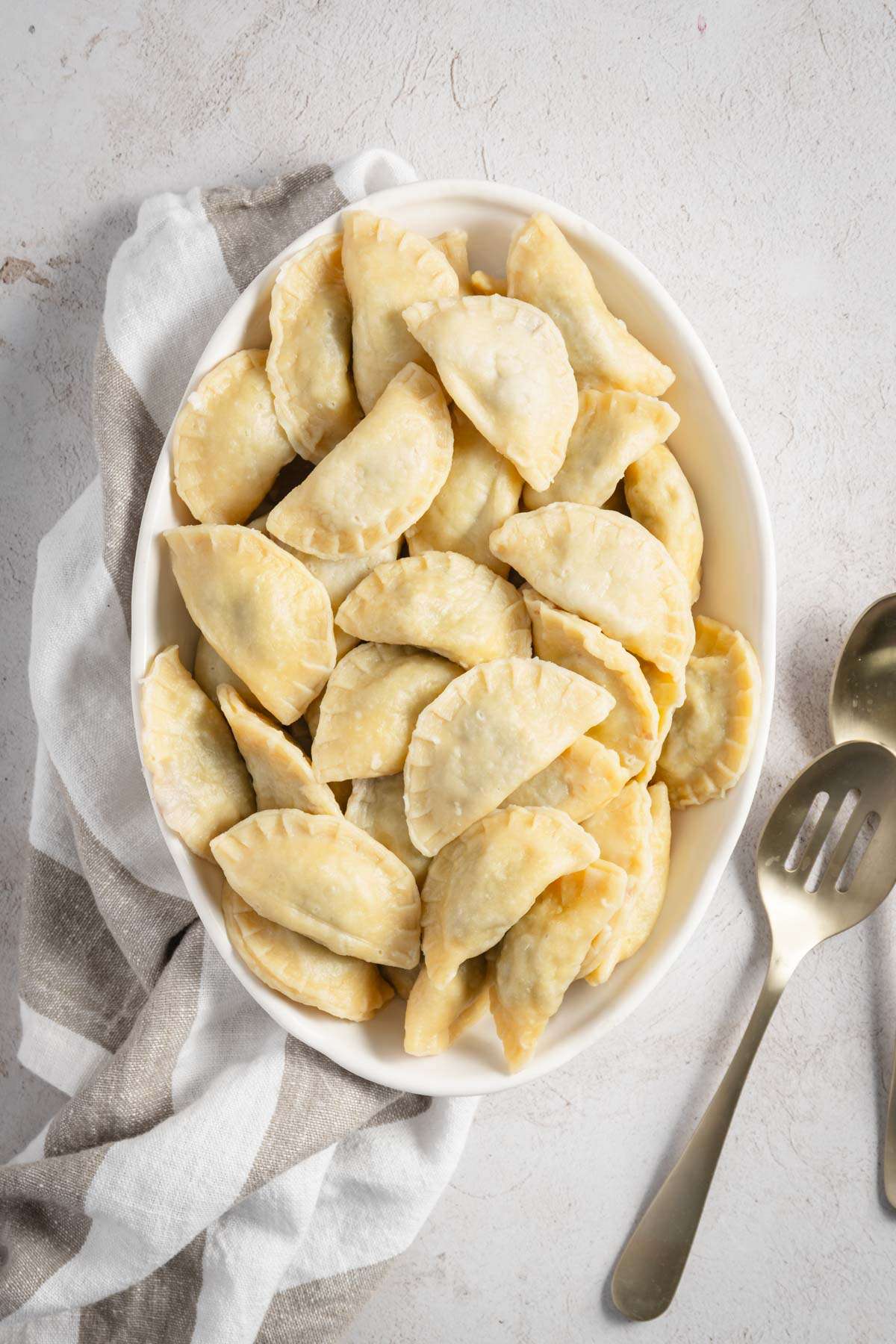 bowl with cooked beef pierogis