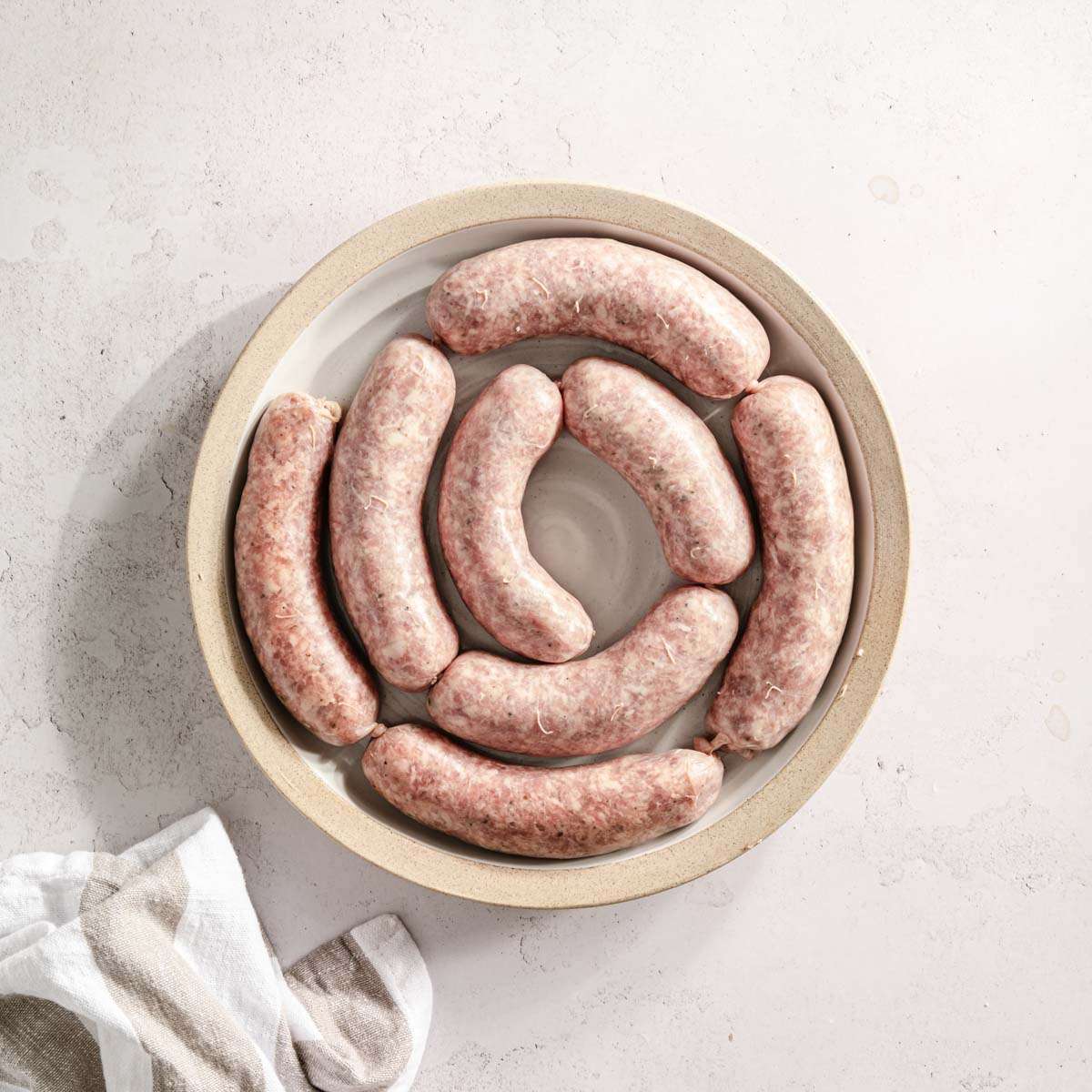 sausage links on a round plate