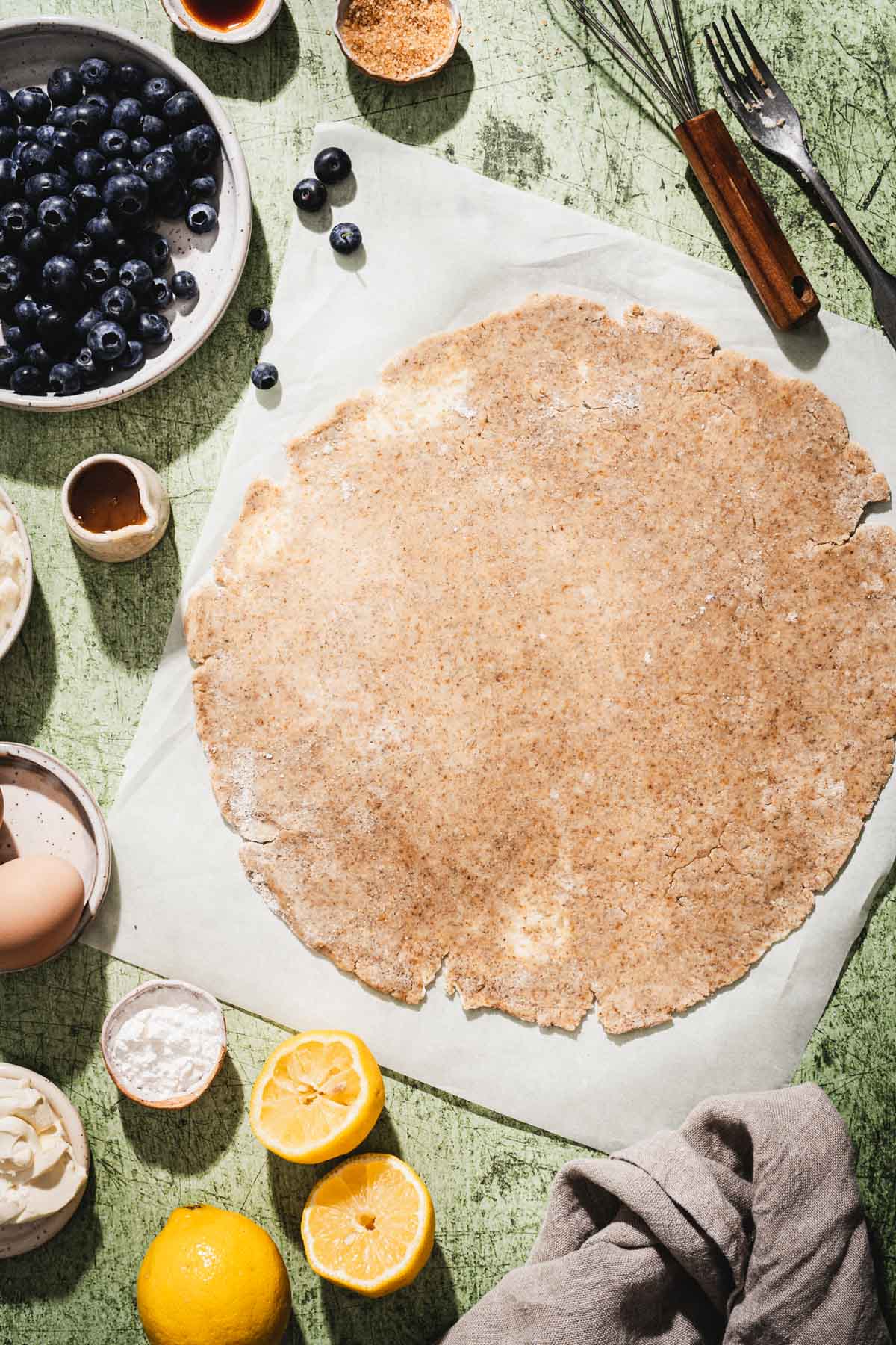 rolled out dough on a parchment paper