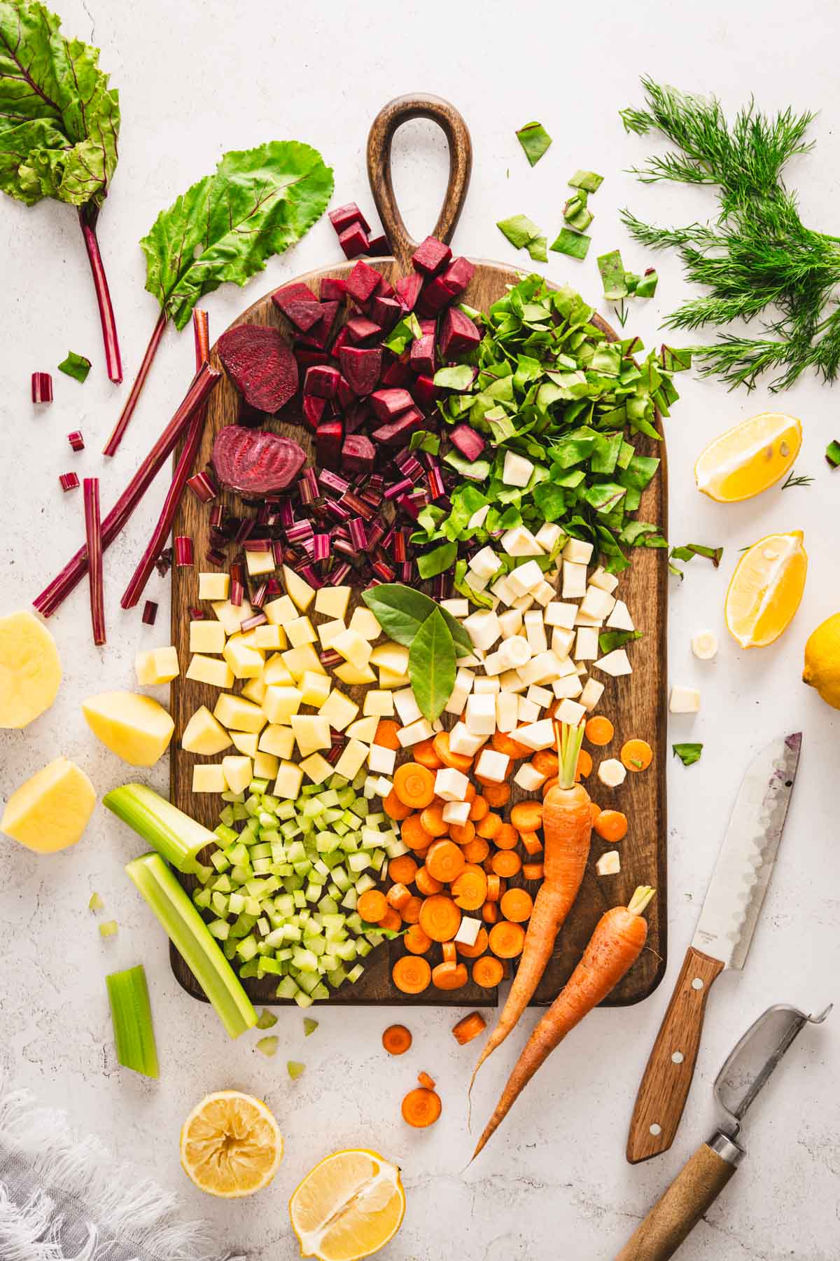 chopped up veggies on a wooden tray