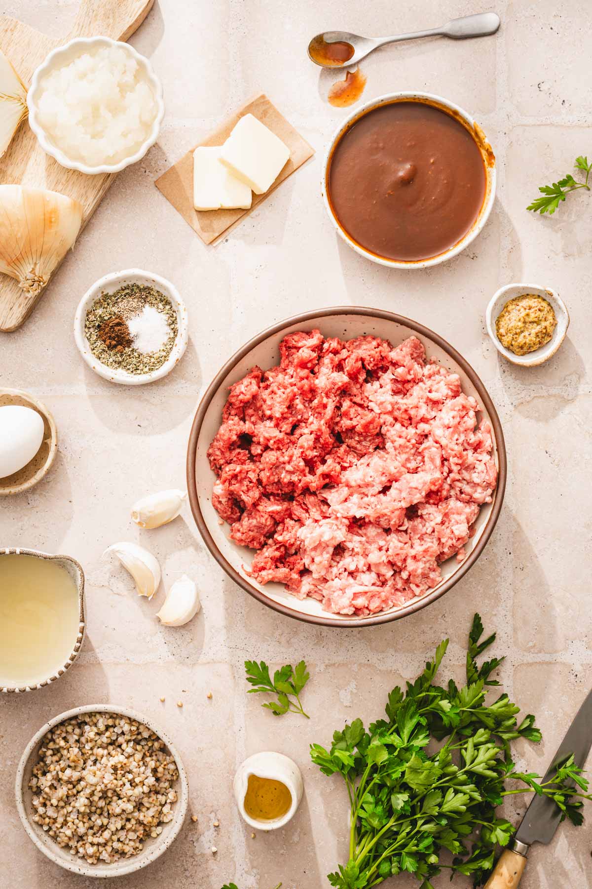 large bowl with ground meat, cooked buckwheat
