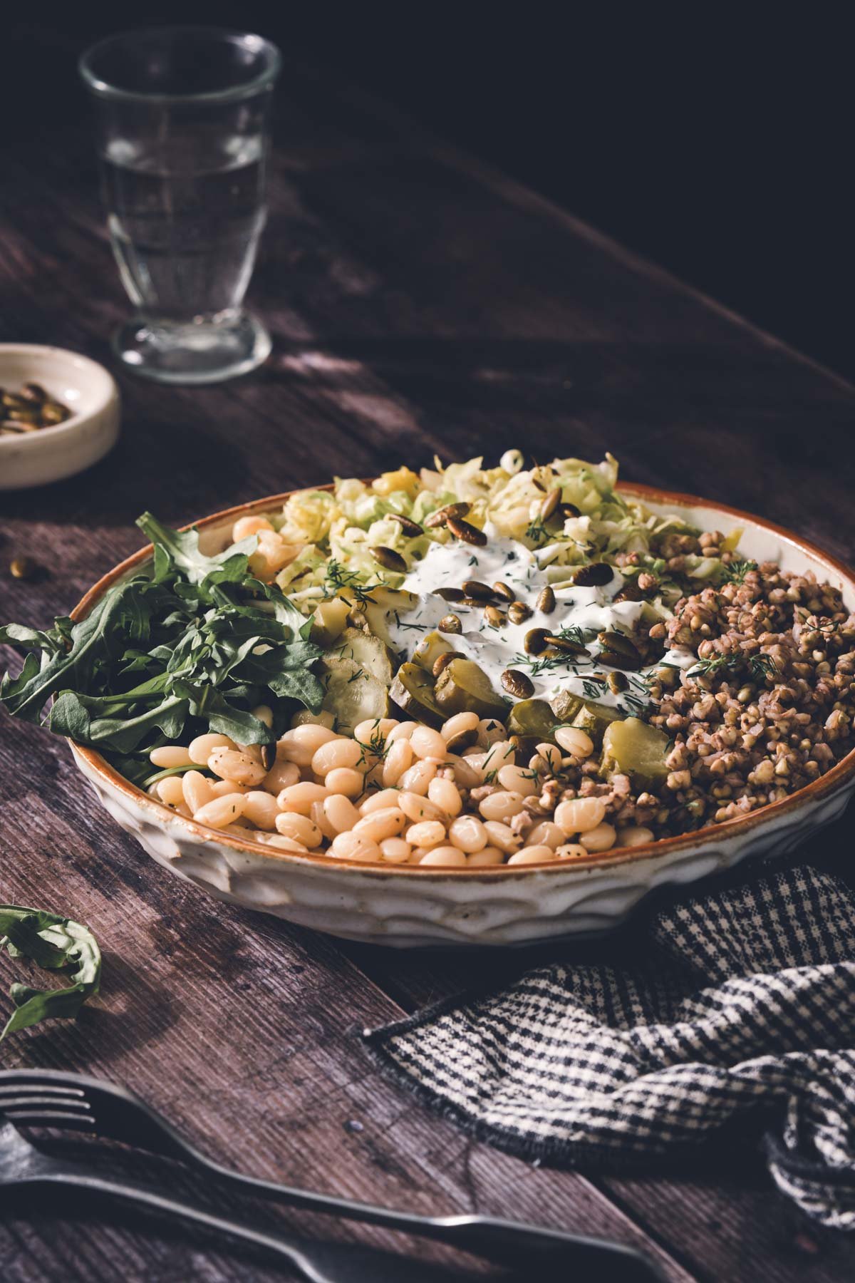 side view of buckwheat bean bowl in a serving bowl