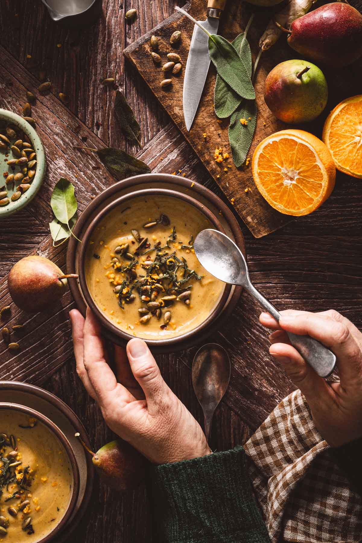 hands in frame holding a spoon