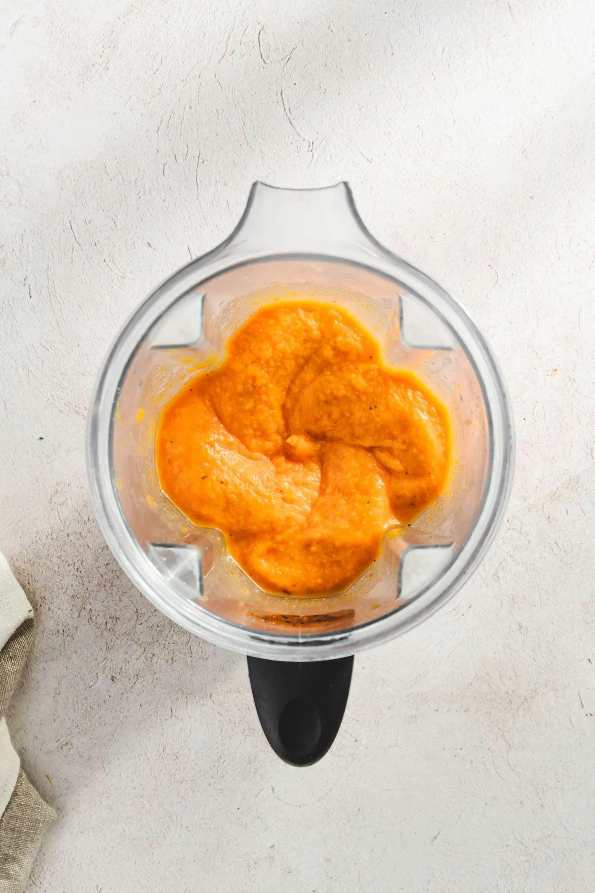 top view, high speed blender with sauce