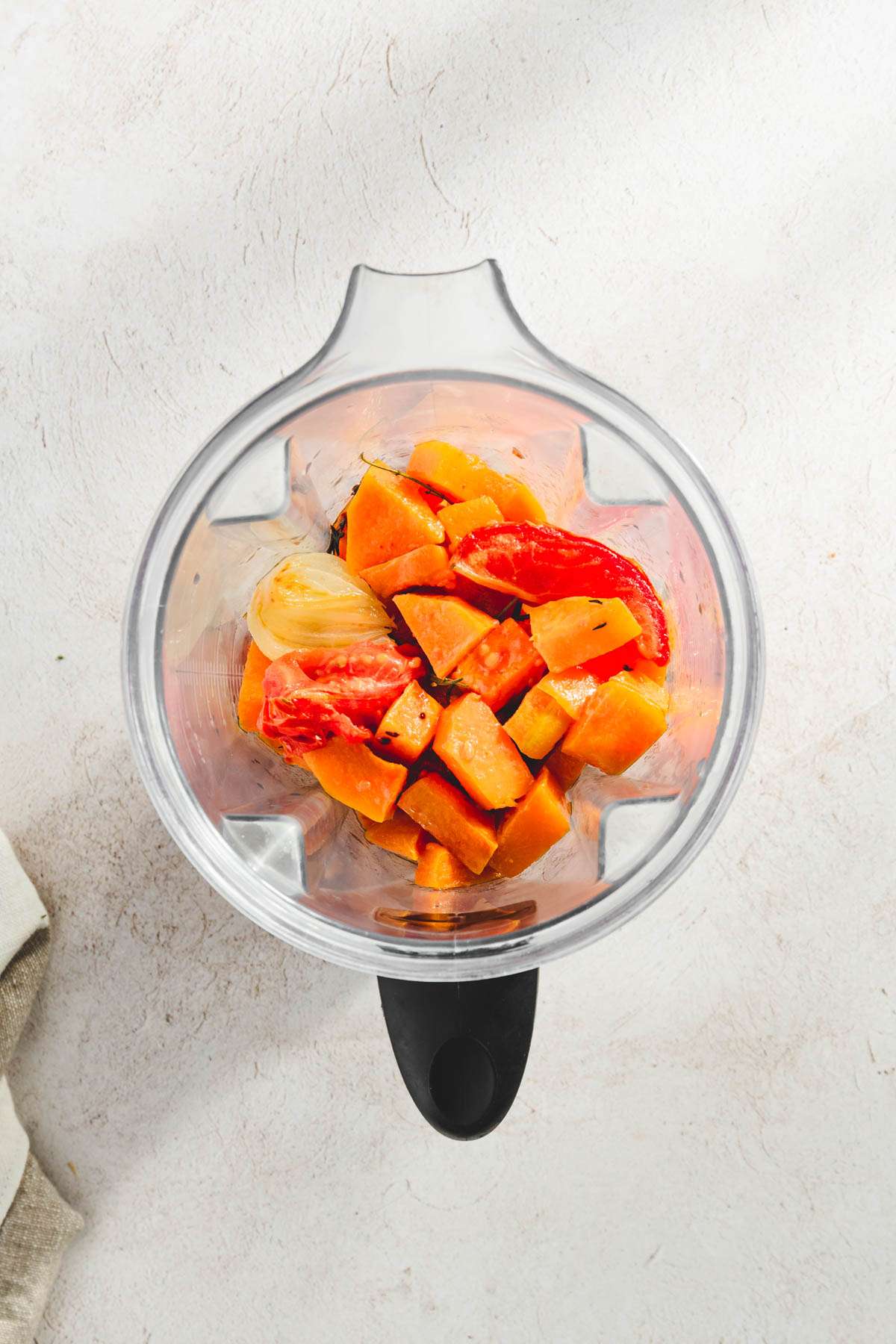 top view, high speed blender with veggies in it