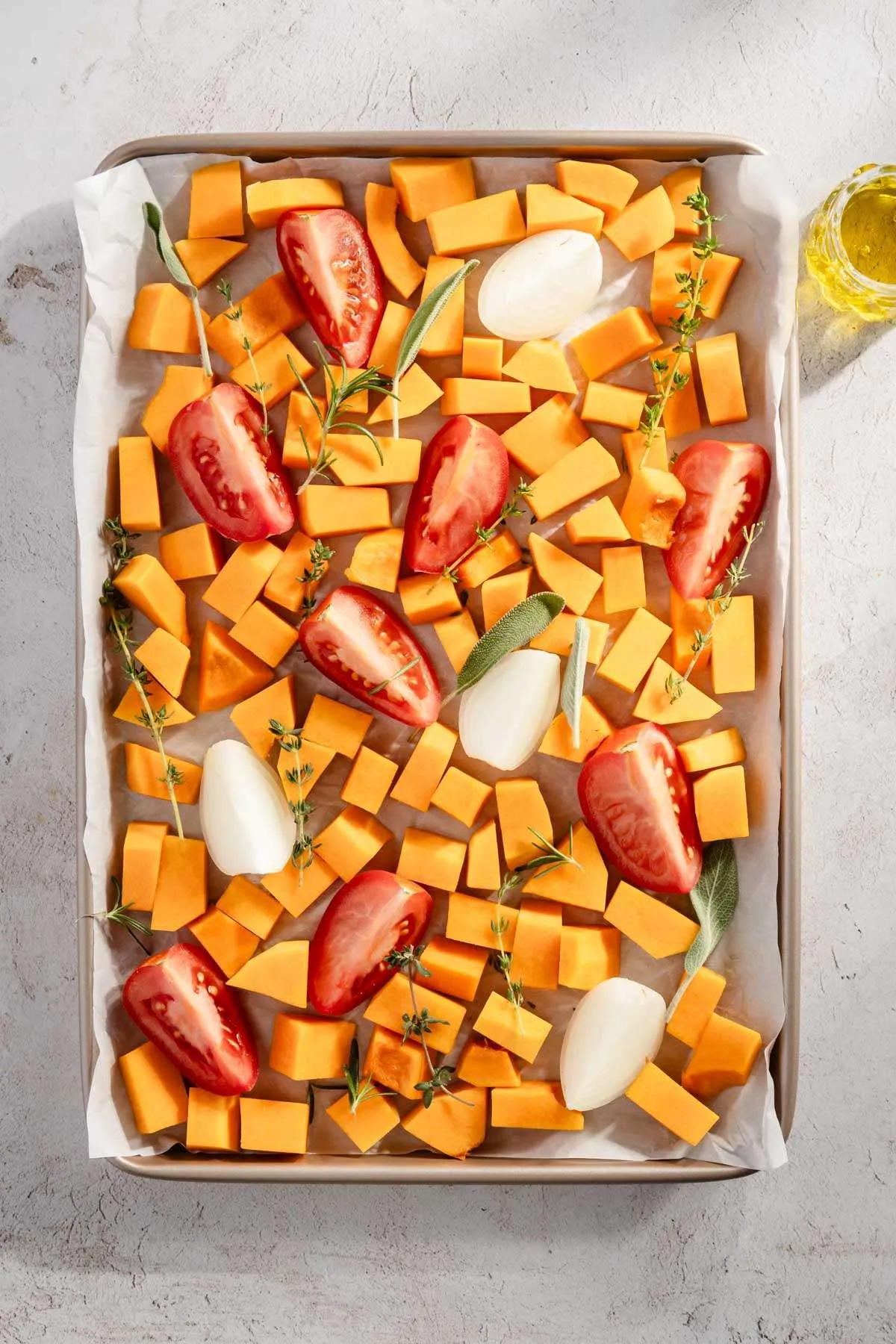 cut up veggies on a baking sheet