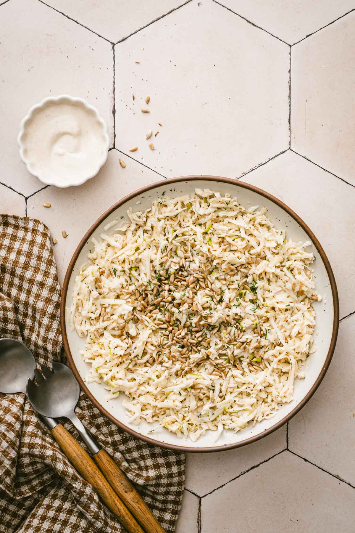 finished salad in a serving bowl, dish with the dressing
