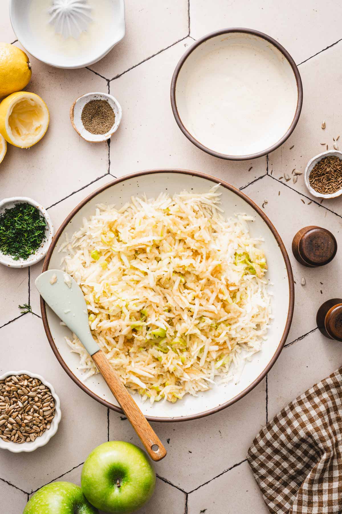large serving bowlwith grated apple and celery root
