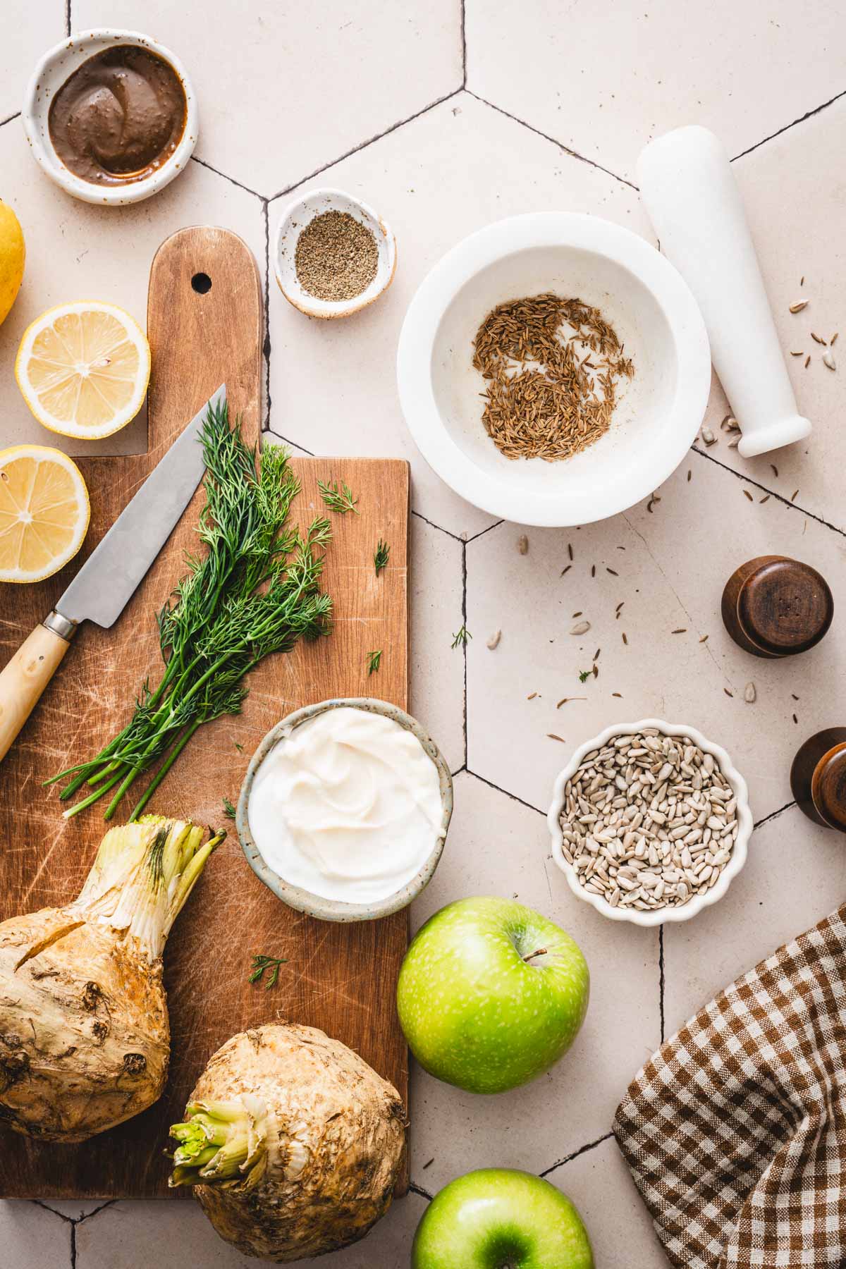 mortal pestle with toasted caraway seeds