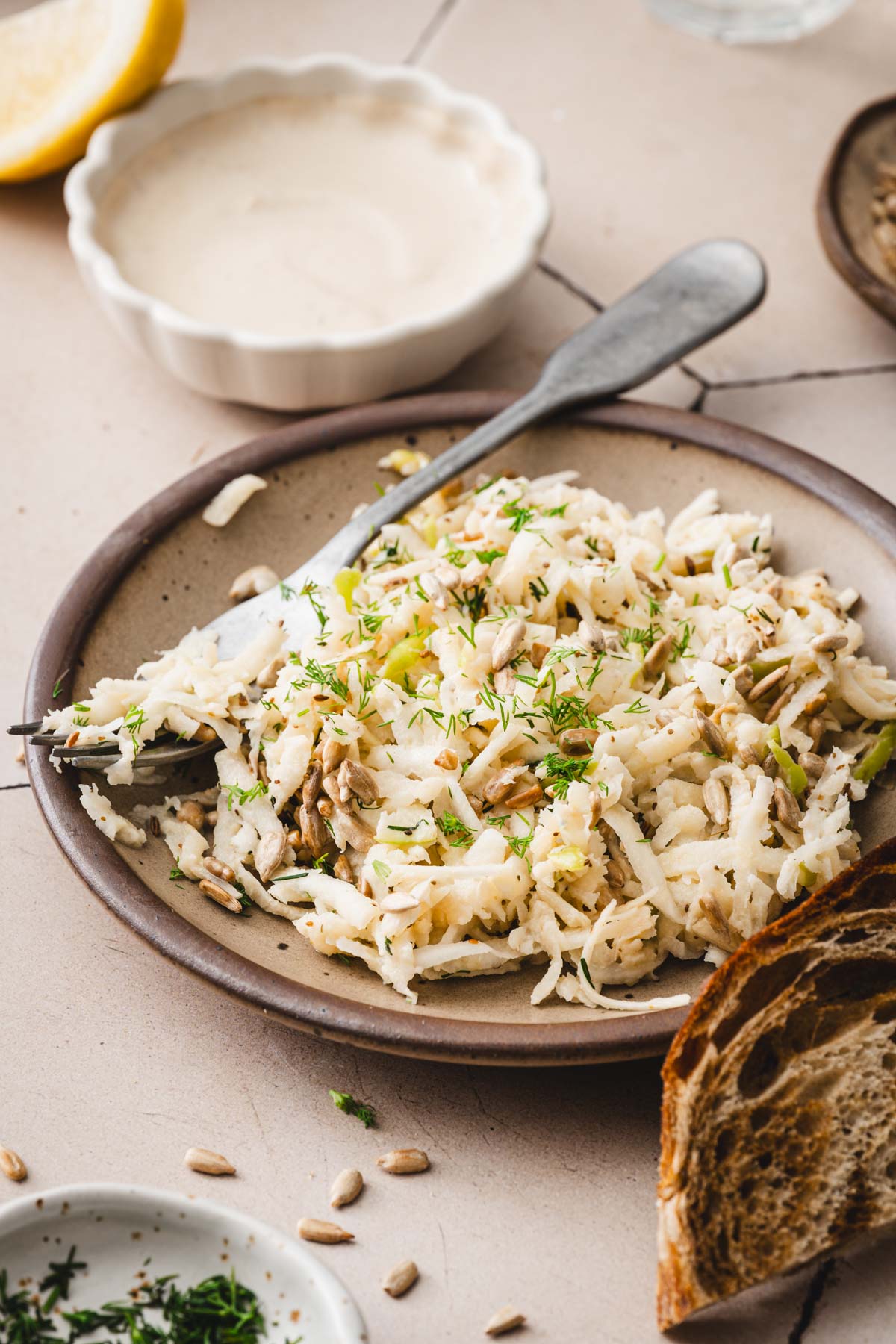 side view of a plate with the salad, dish with the dressing