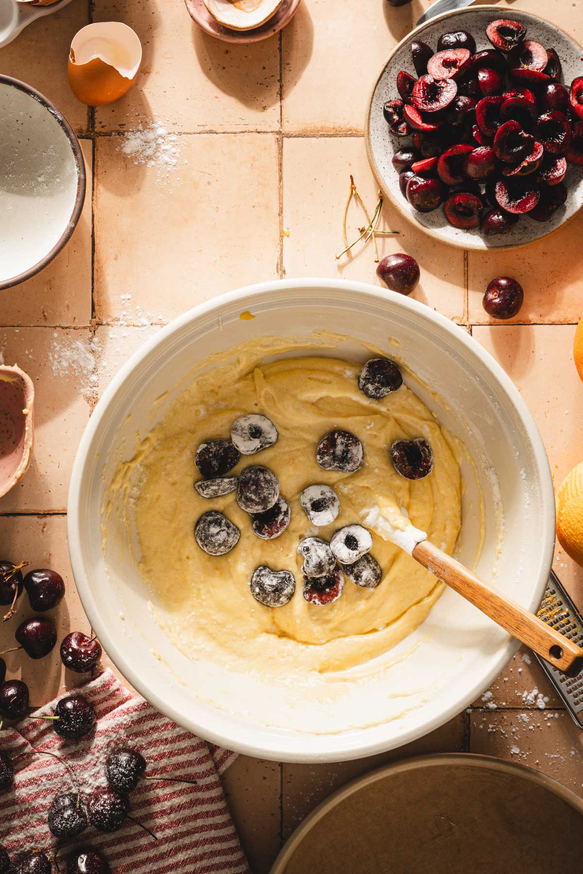 some cherries added to the cake batter