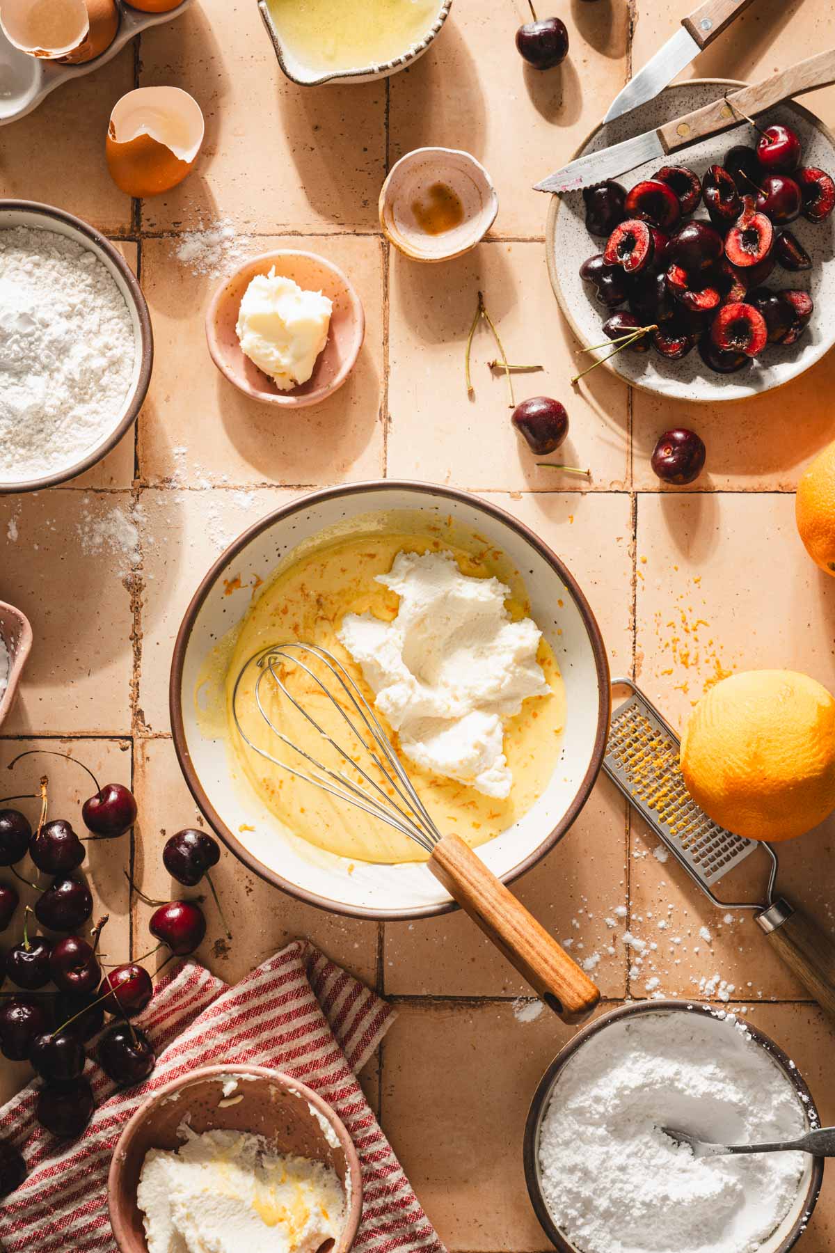 ricotta, vanilla and orange zest added to the beaten egg yolks