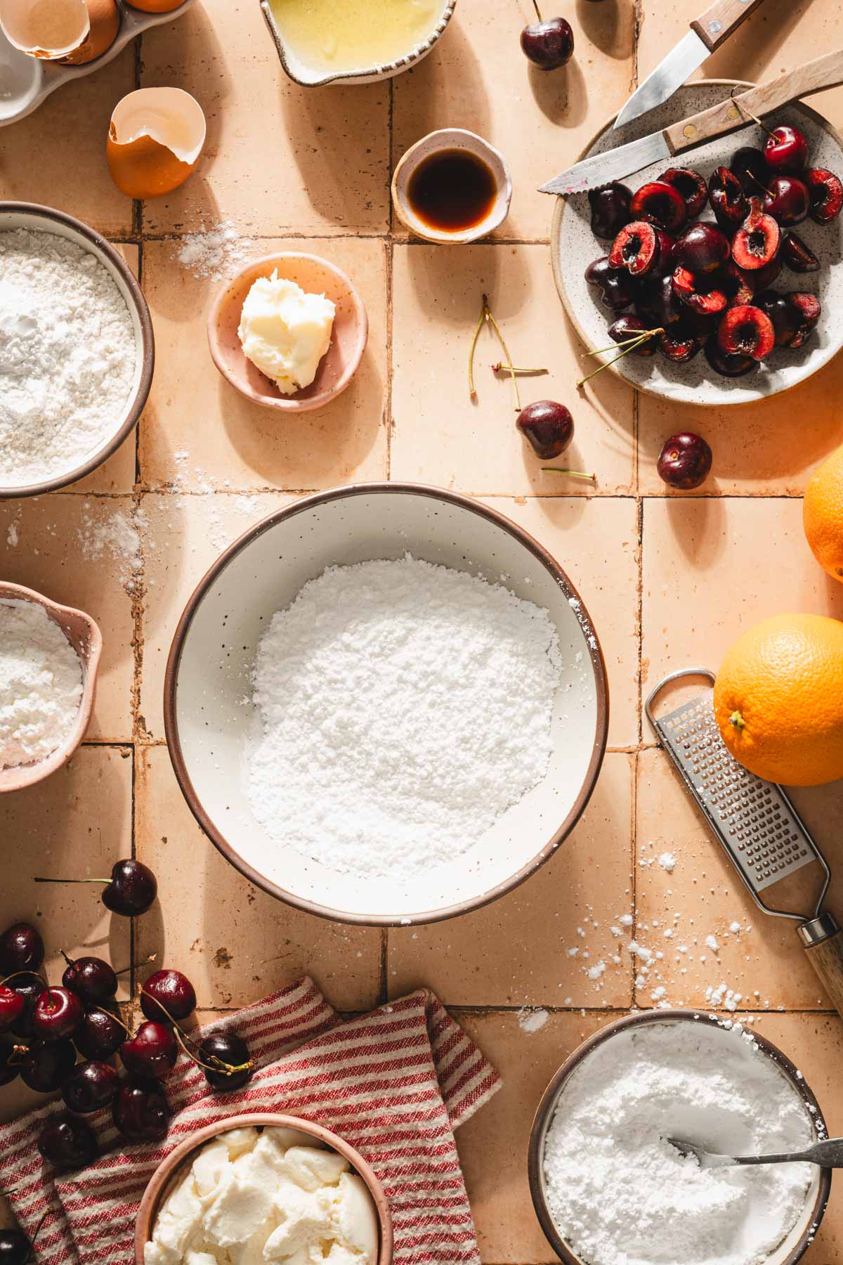 bowl with powdered sugar, other ing around