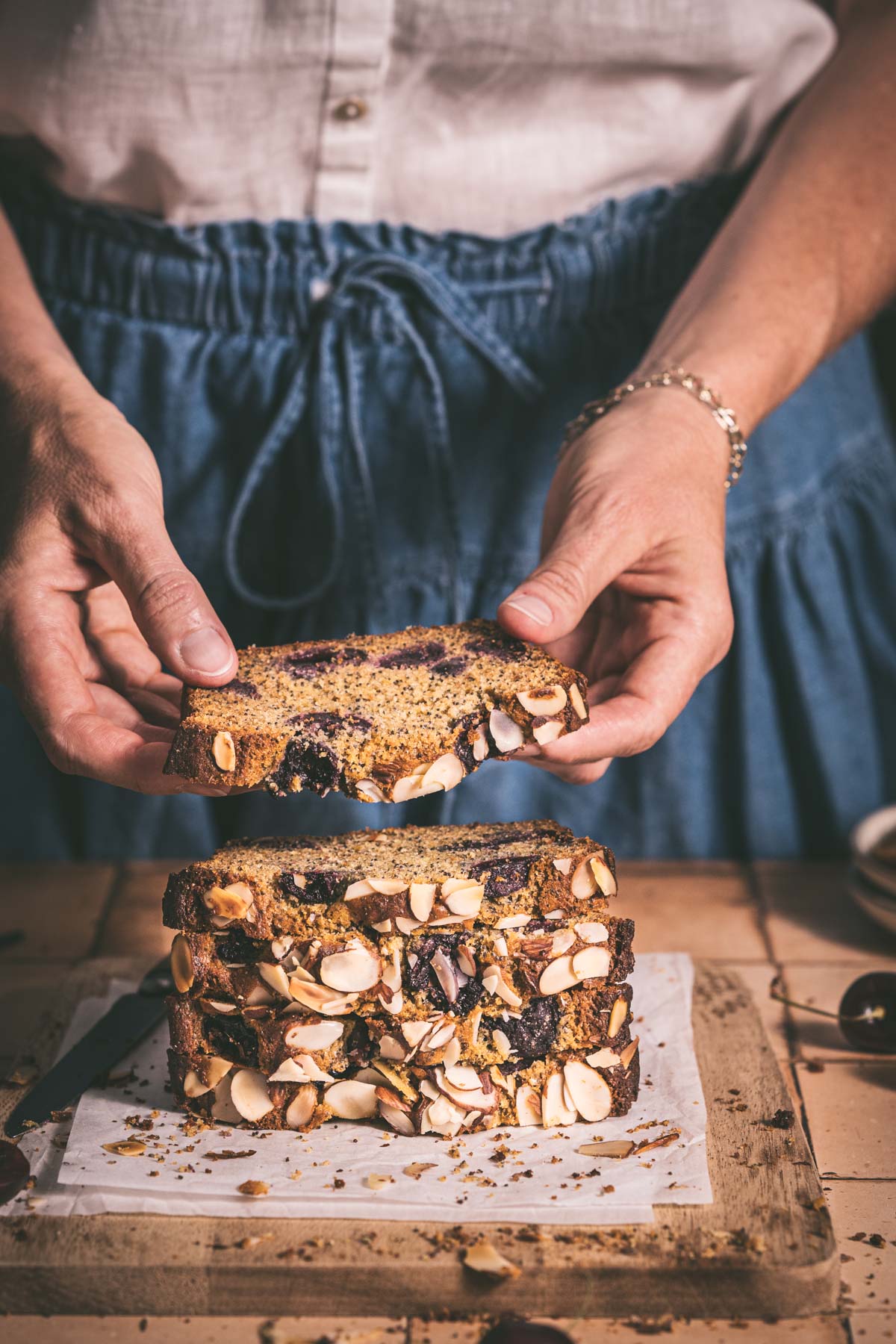 hands in frame holding a slice