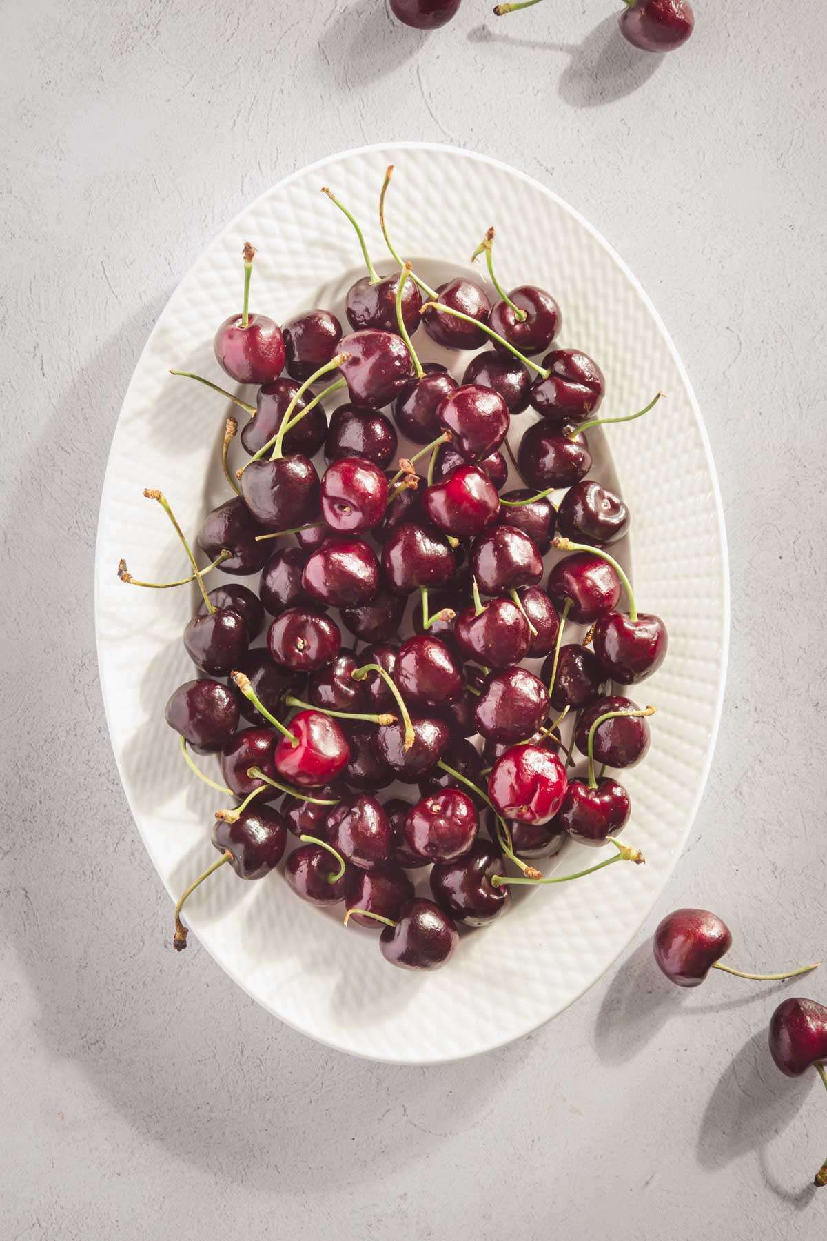 fresh cherries on a platter