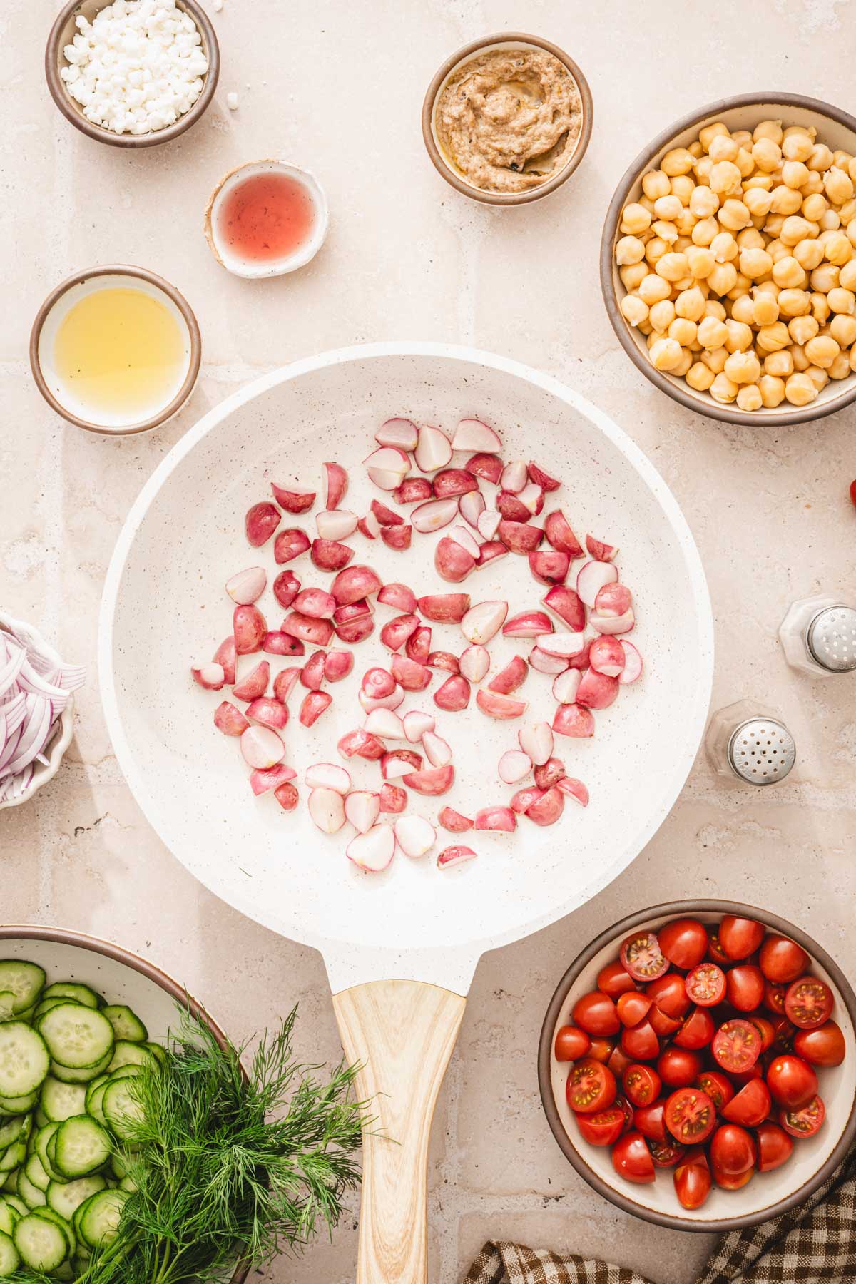 skillet with coooked radishes