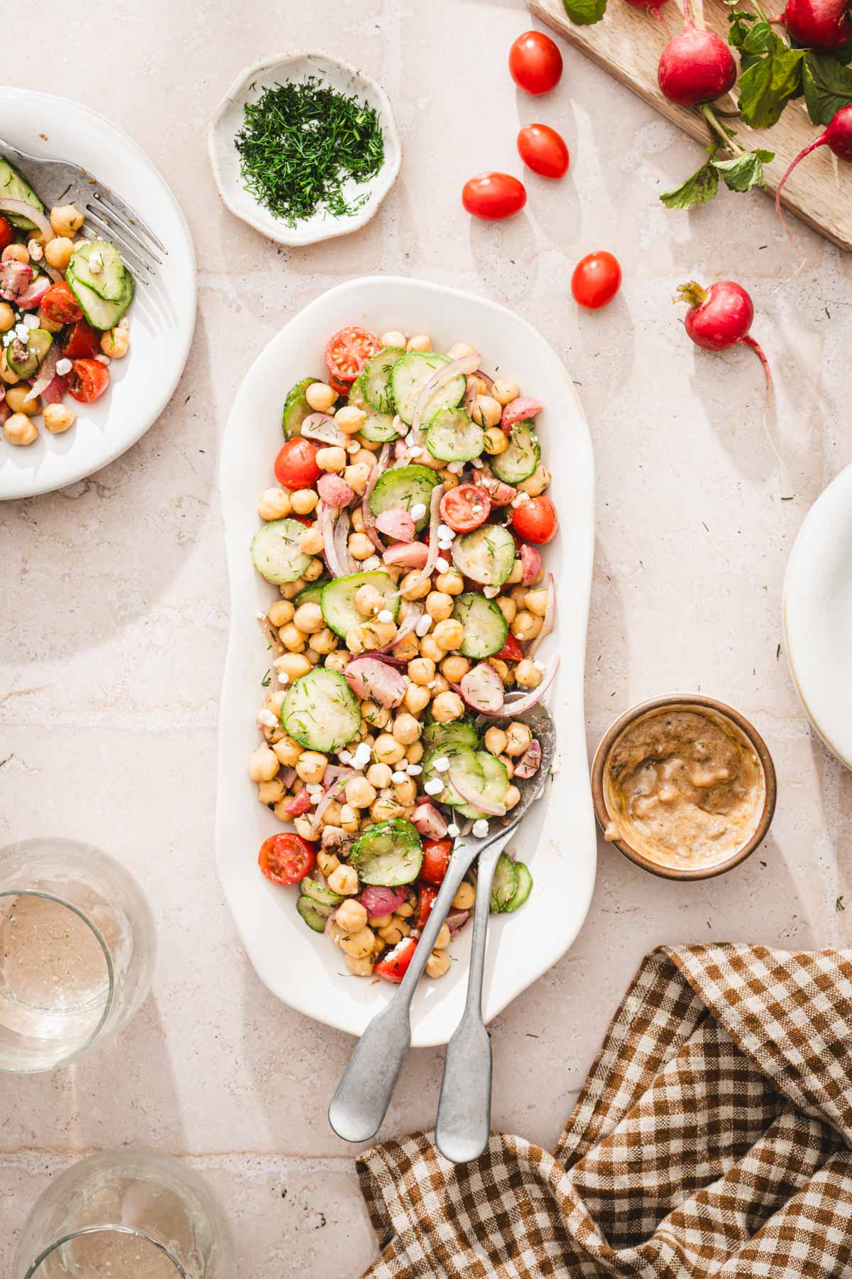 smaller serving platter, plates, napkin