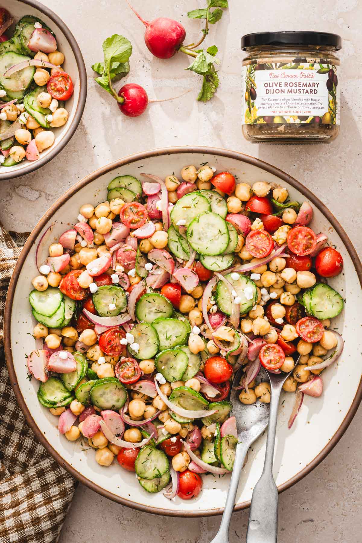 large bowl with salad, dish with mustard