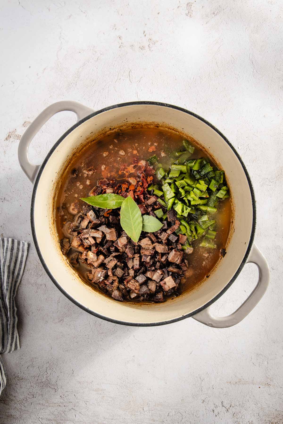 cooking pot with all the chili ingredients in it, ready to cook