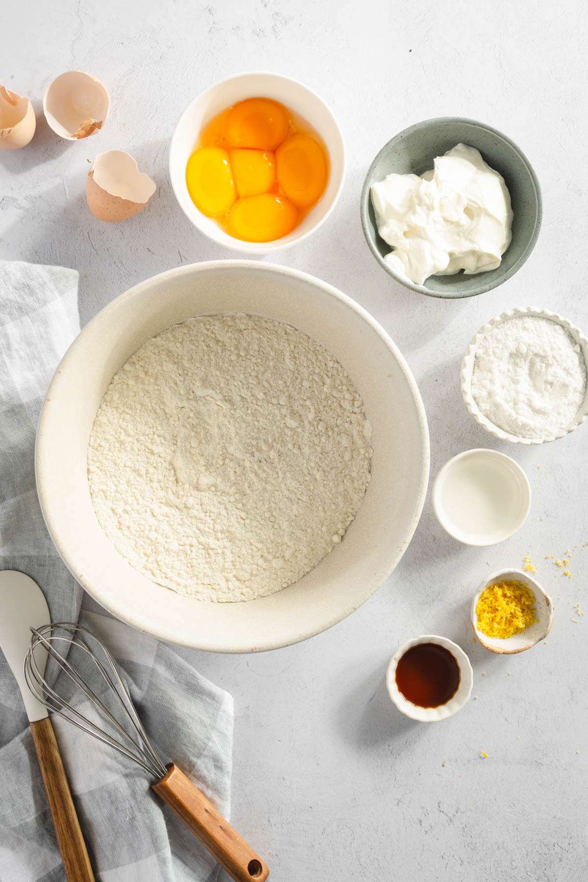 ingredients for Chrusciki arranged in various bowls