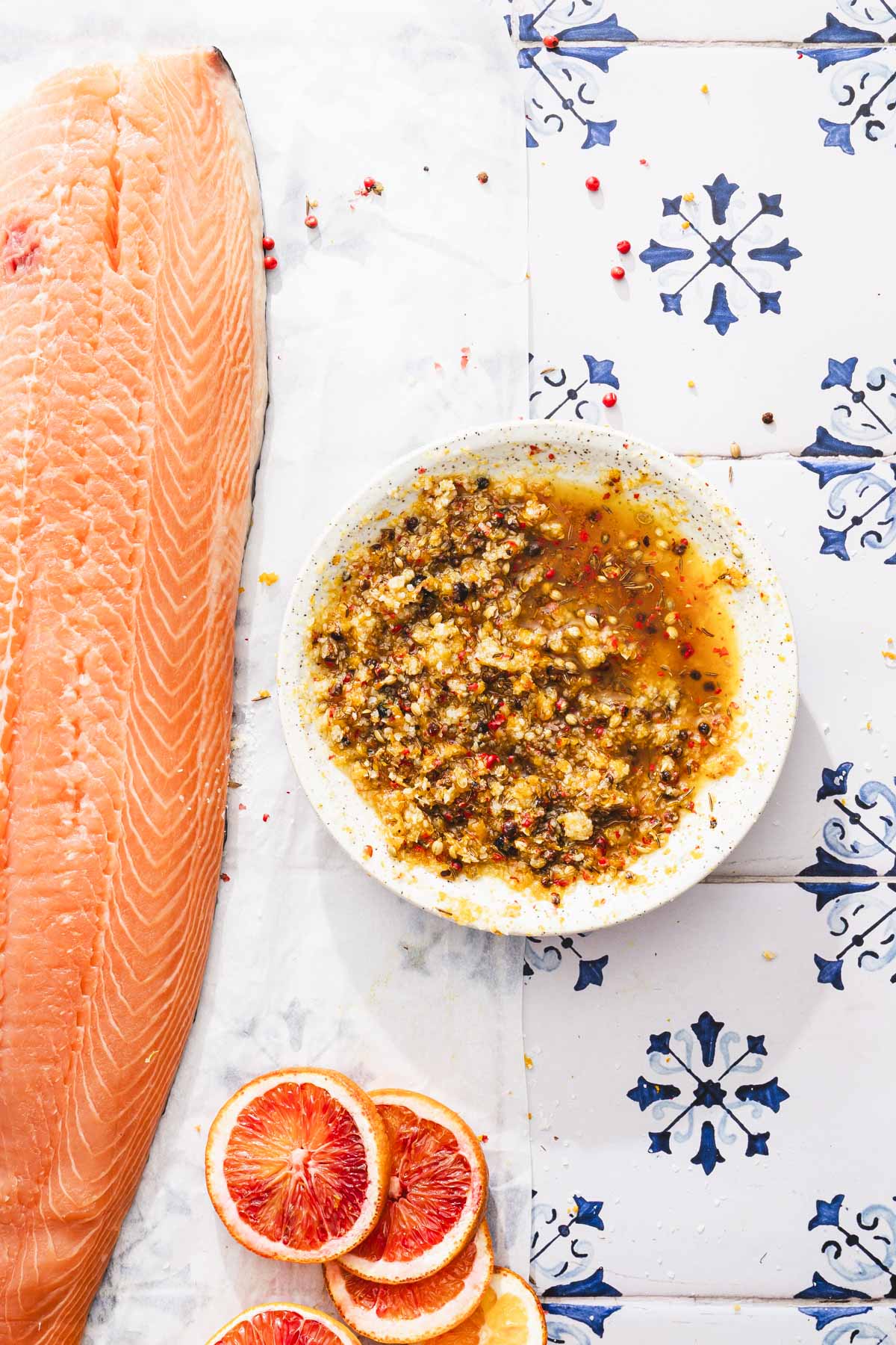 piece of salmon and a dish with cure