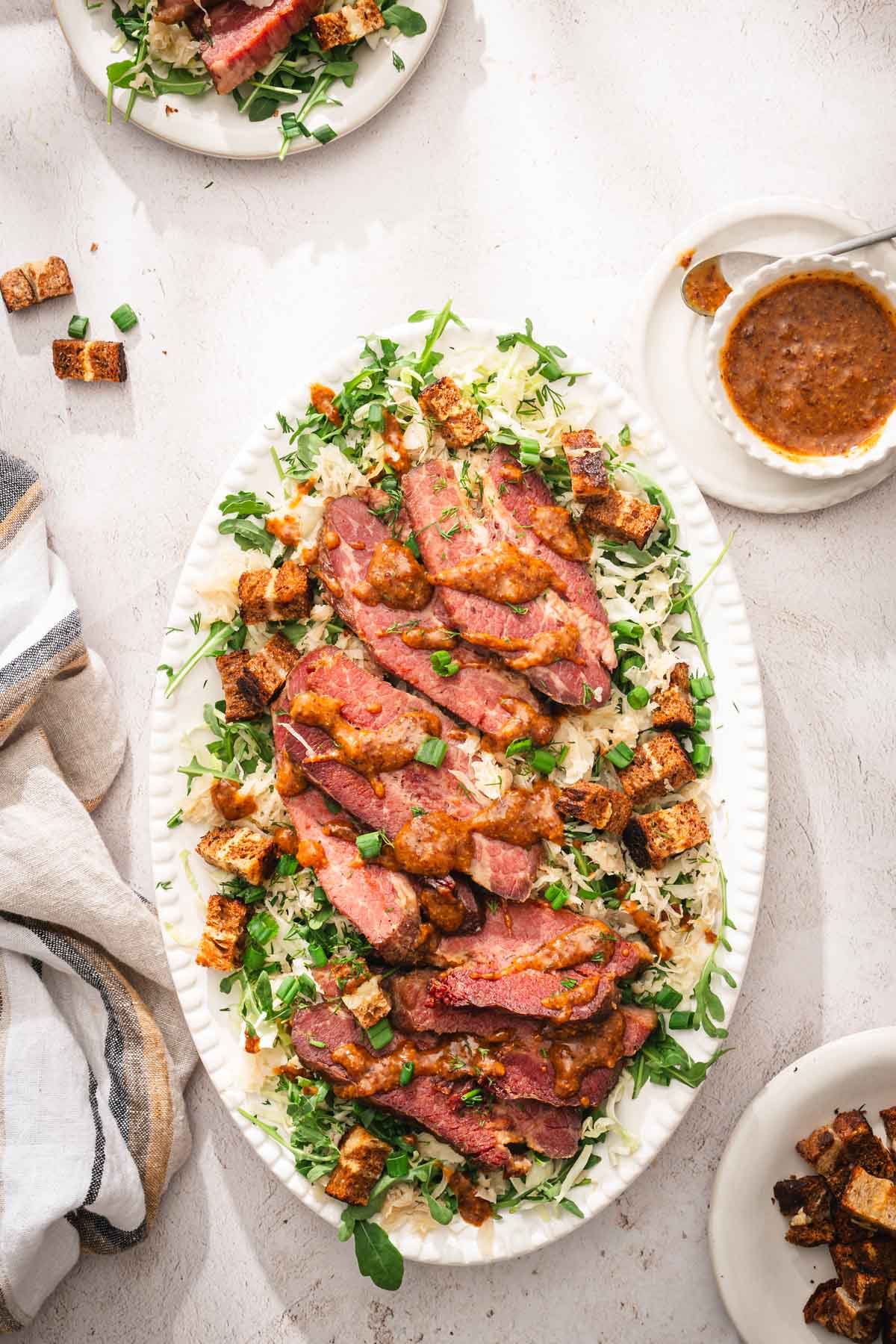 platter with the salad, plate with croutons