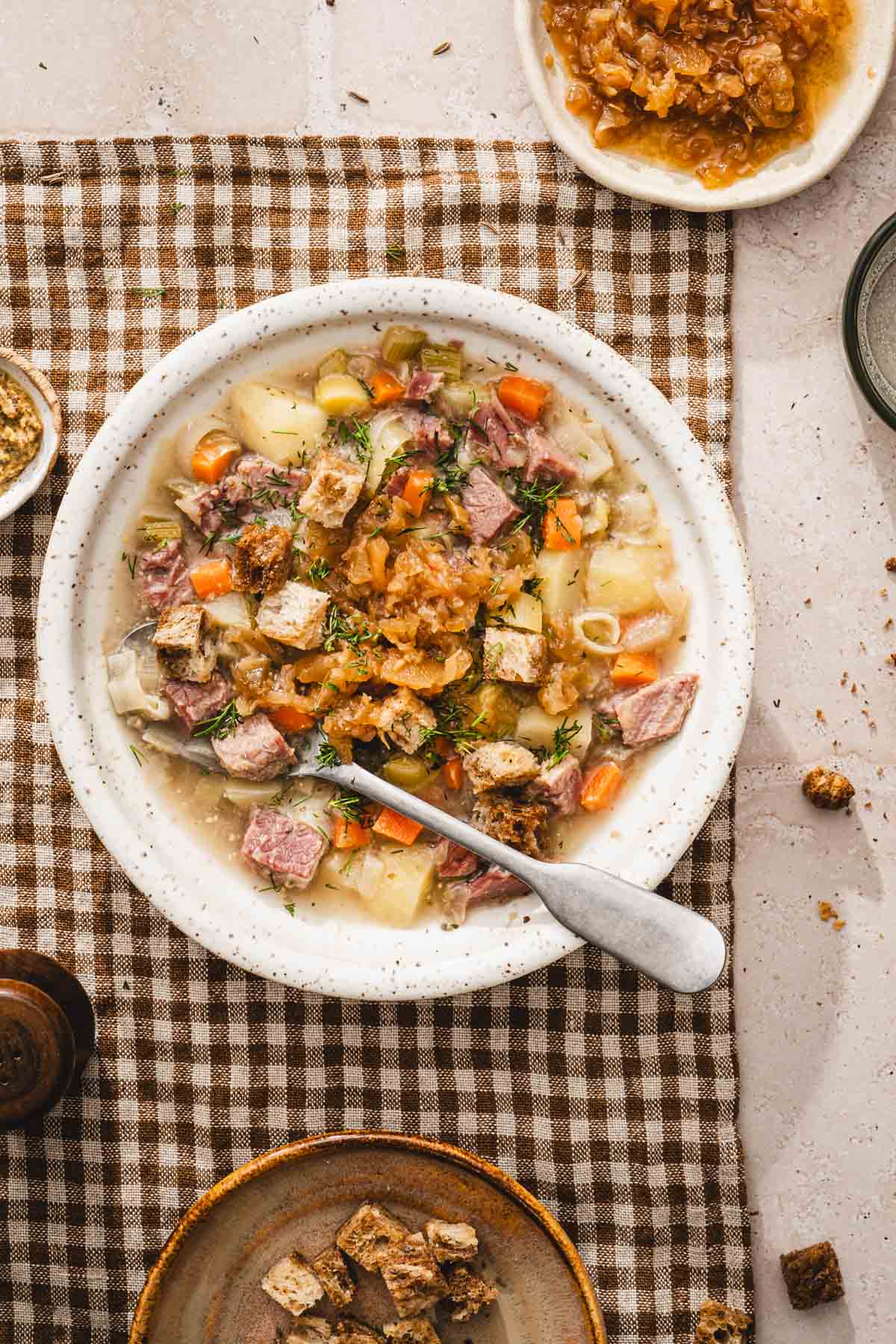 close up of a bowl with soup, dish with croutons