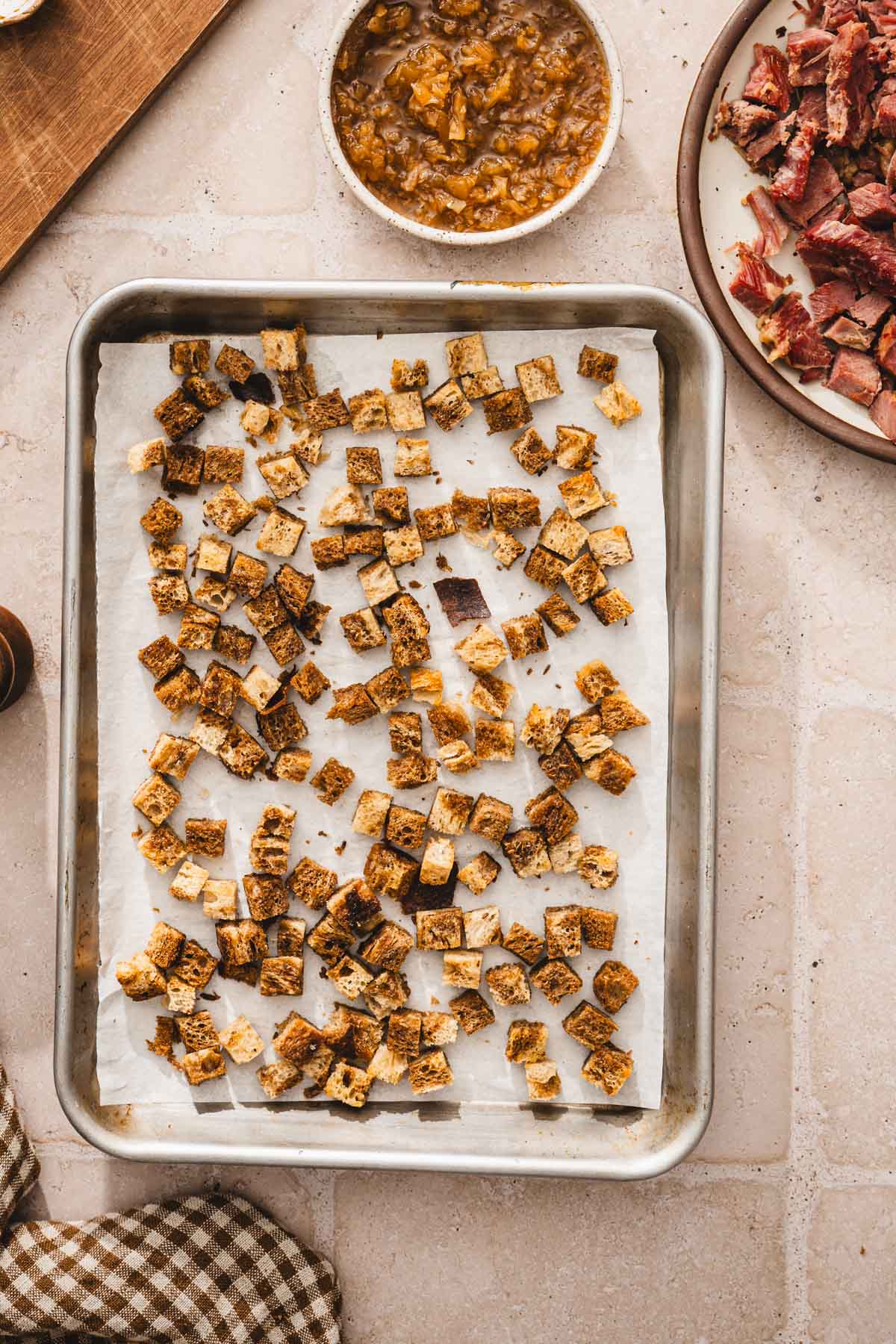 baked croutons on a baking sheet