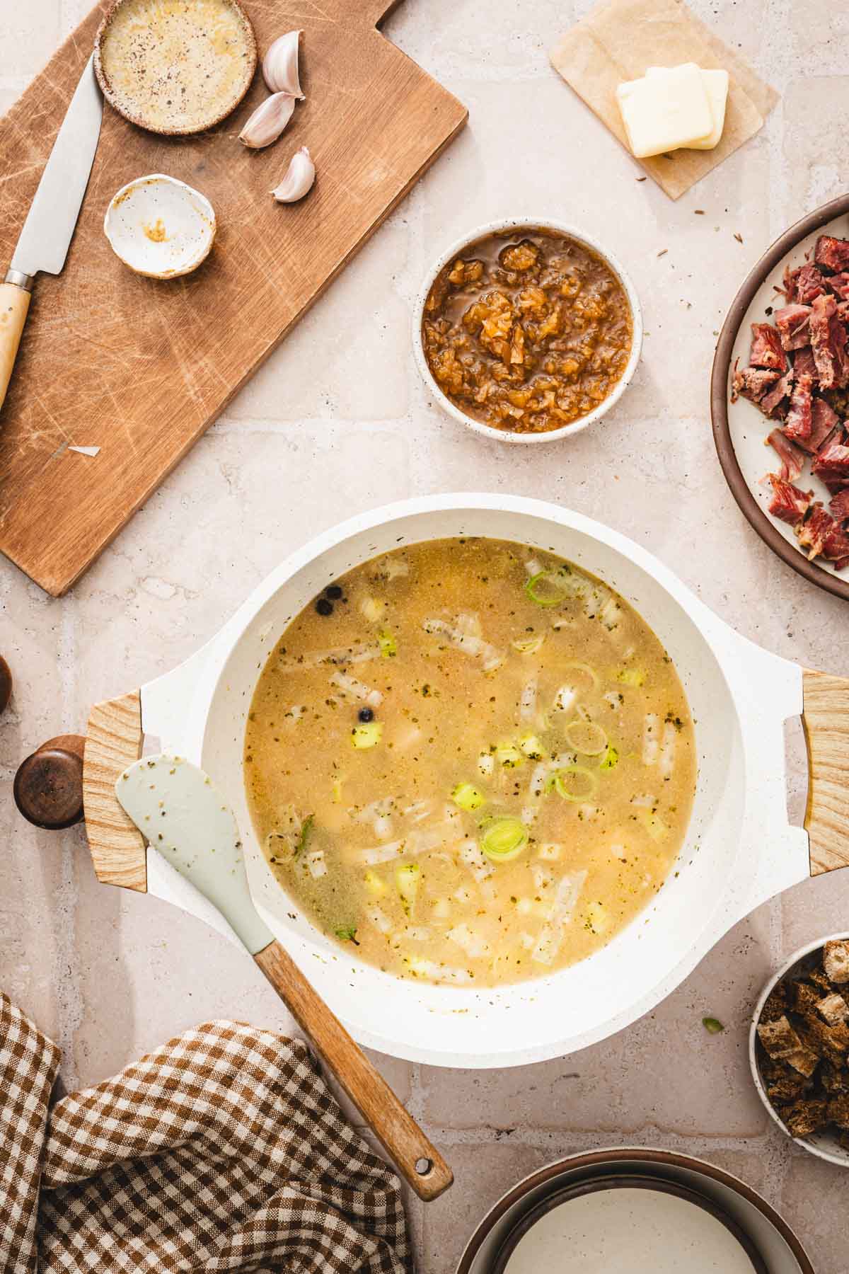 soup pan with aromatics adn broth