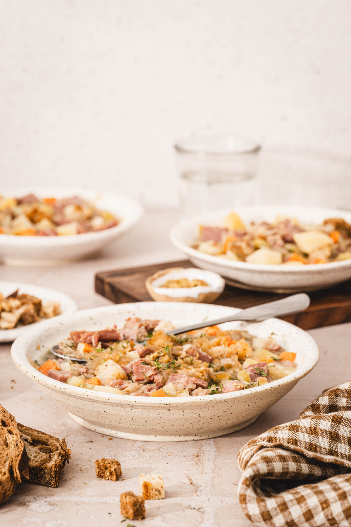 various bowl with soup, glass with water