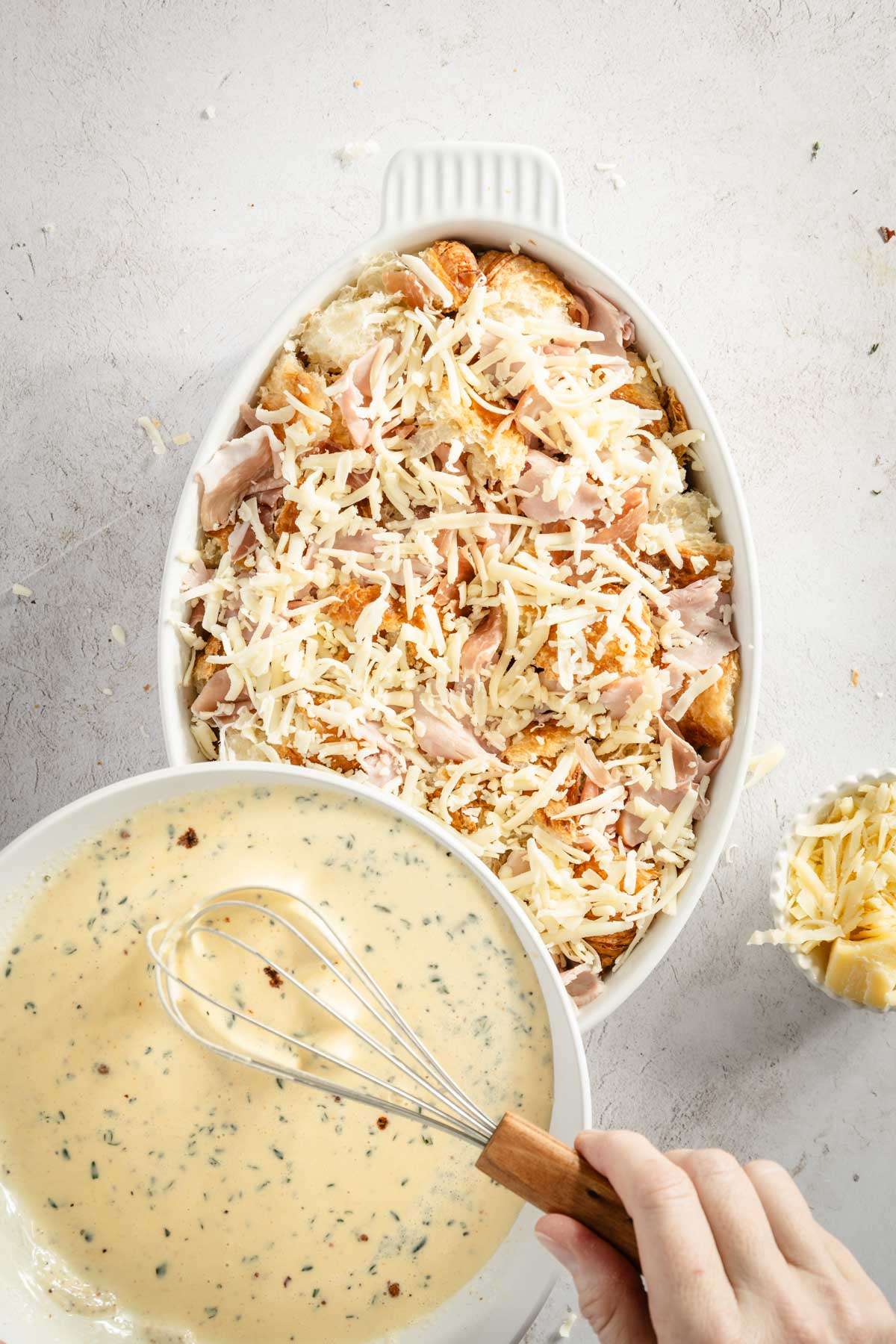 adding liquid ingredients to the croissant bake