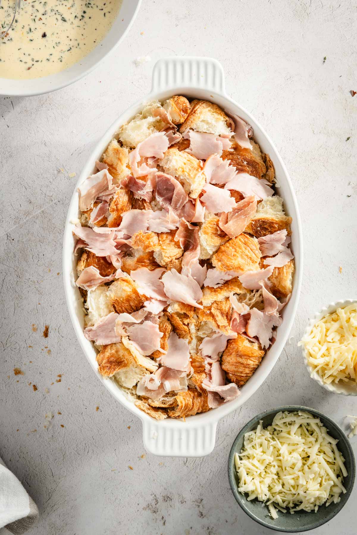 croissant bake in a serving dish, before baking