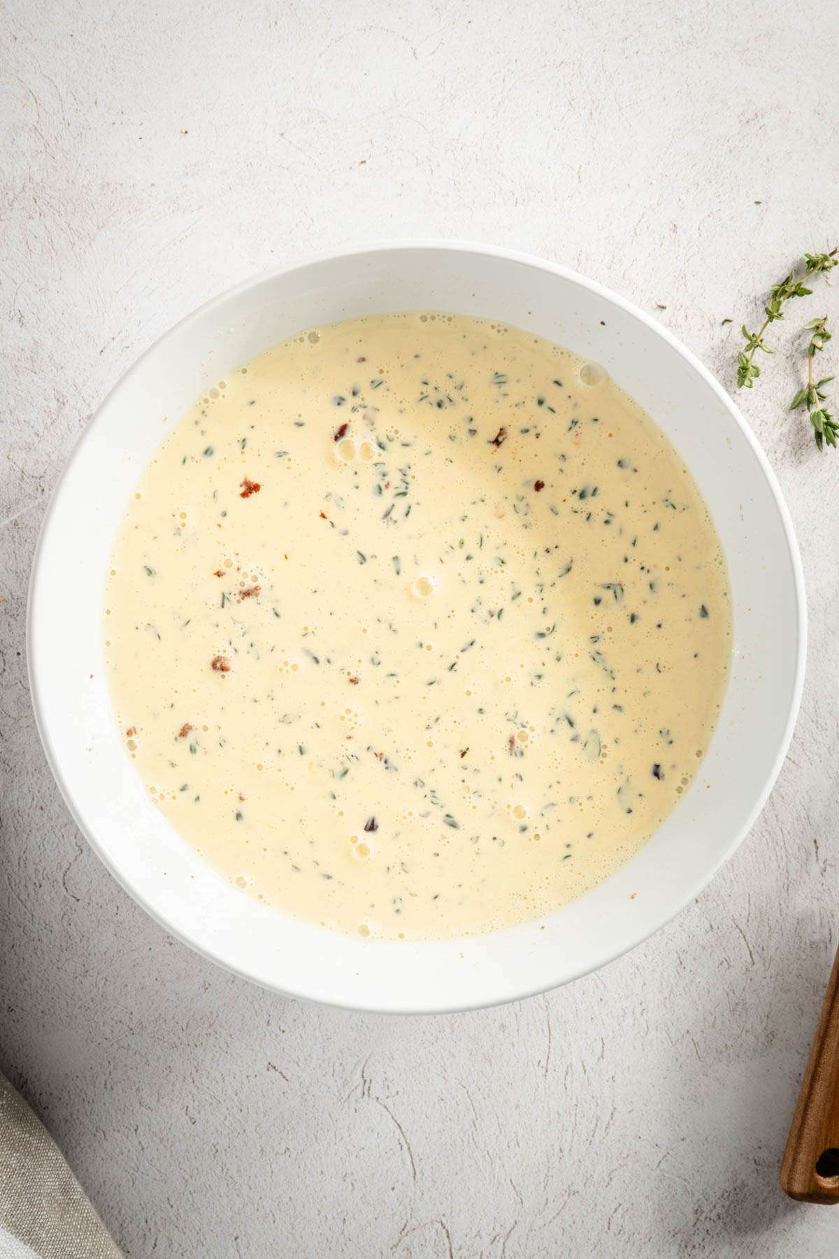 liquid ingredients mixed in a large bowl