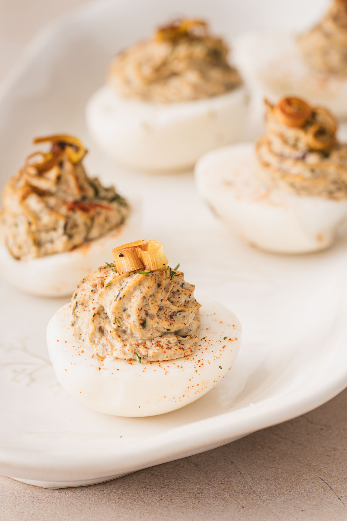 close up of dviled eggs on a plate