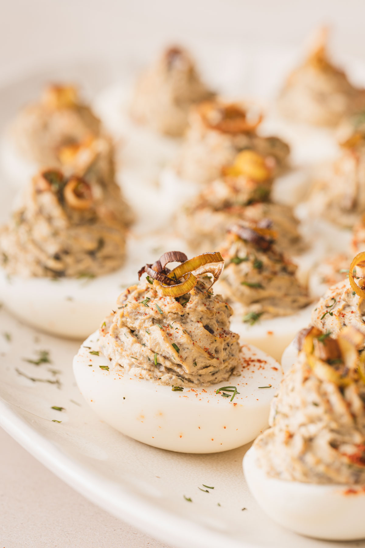close up of dviled eggs on a plate