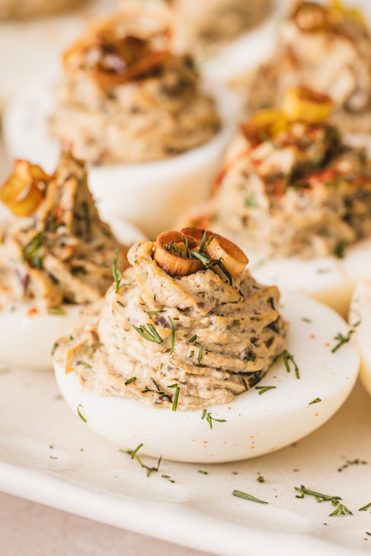 close up of dviled eggs on a plate